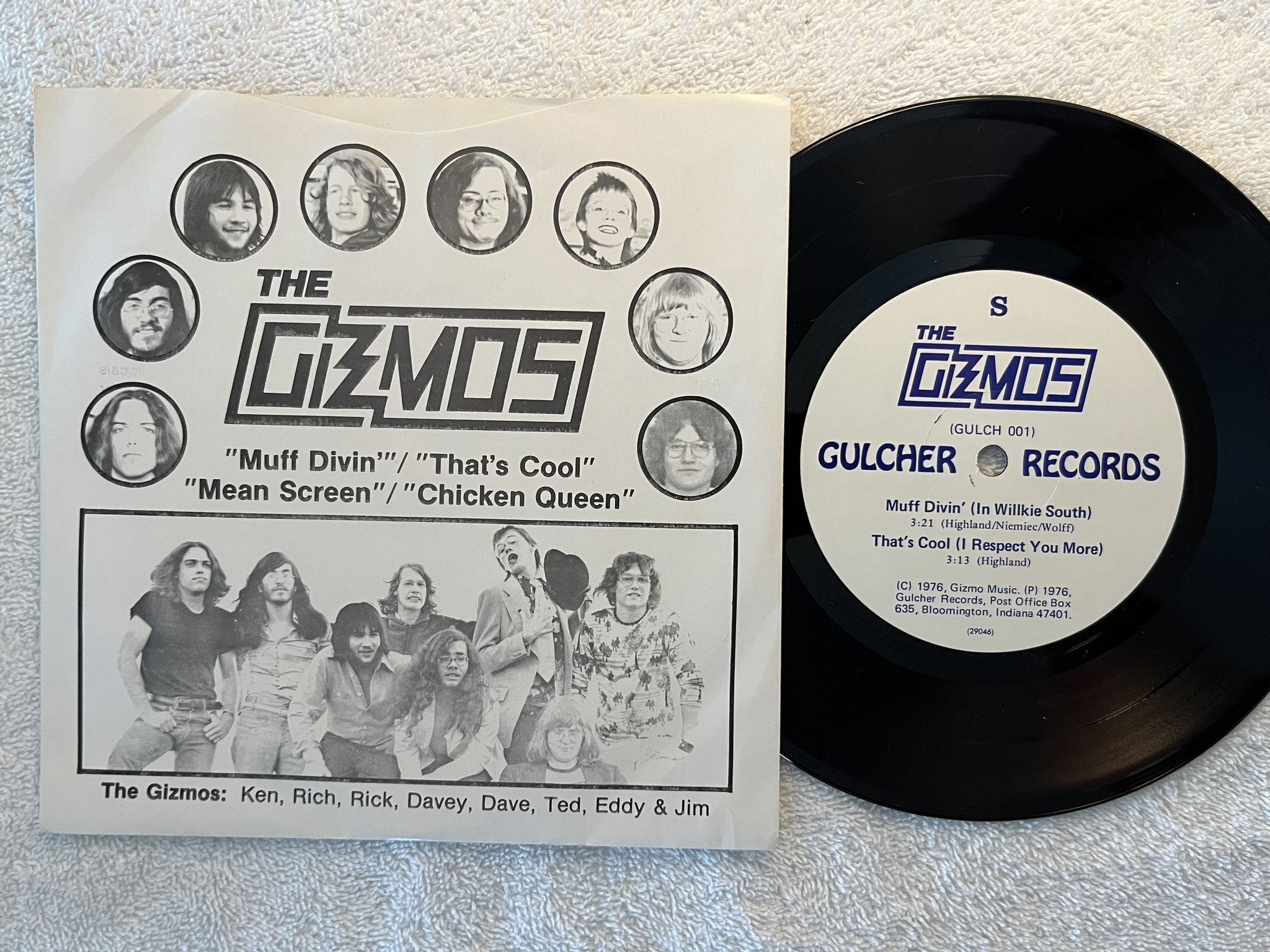 Omslagsbild för skivan THE GIZMOS Muff Divin' 7" -77 US GULCHER GULCH 001 ** PUNK ** blue text