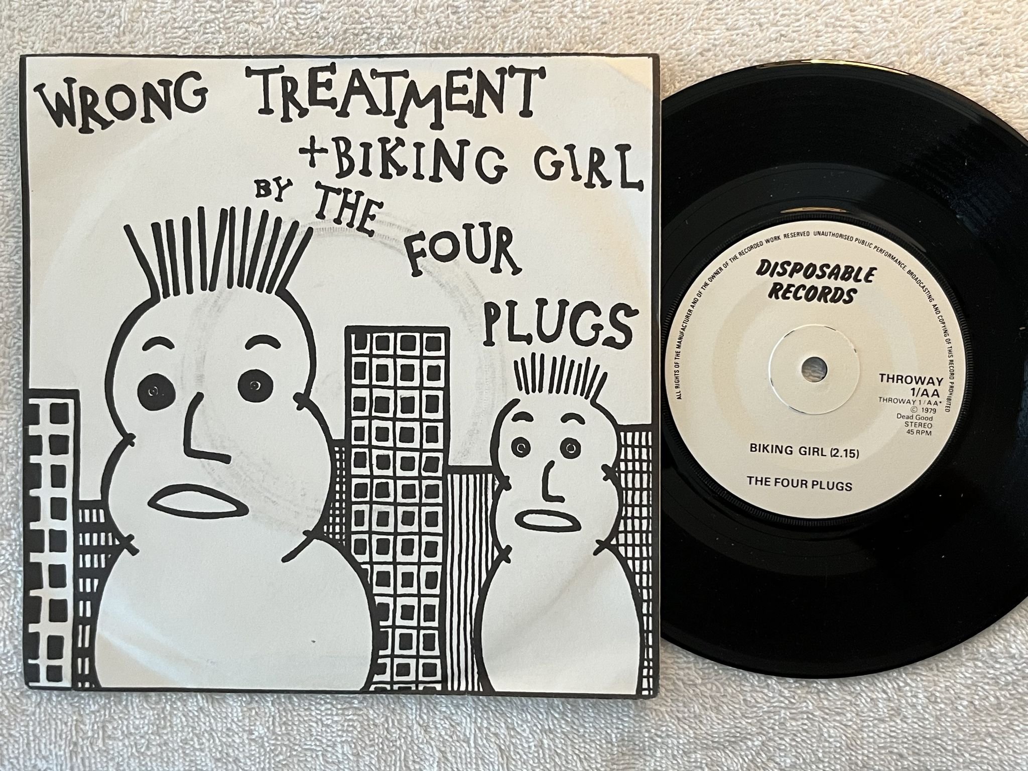 Omslagsbild för skivan THE FOUR PLUGS Wrong Treatment 7" -79 UK disposable THROWAY 1 ** Art Rock **