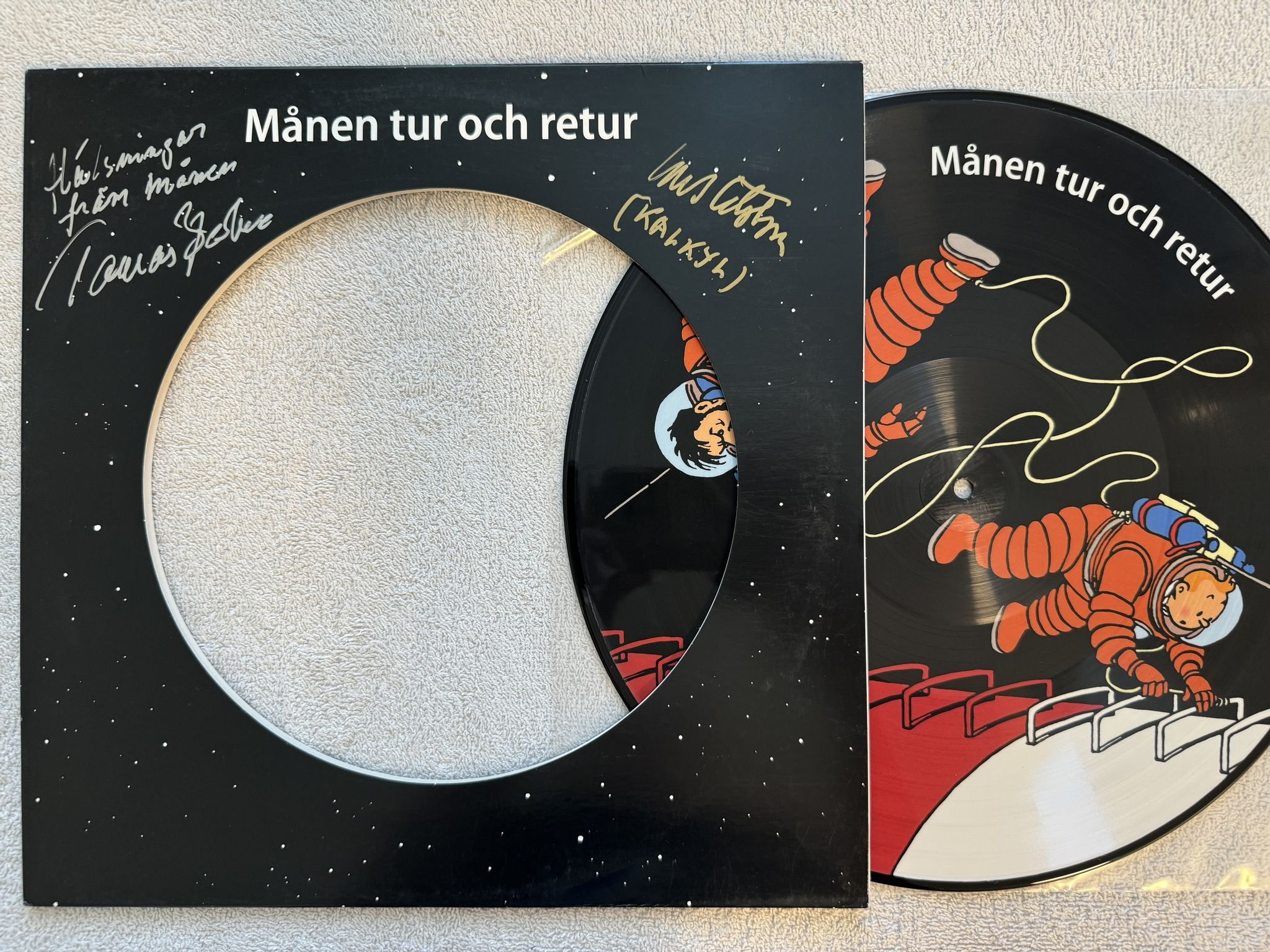 Omslagsbild för skivan Hergé – Tintin: Månen Tur Och Retur 12" PICTURE DISC Cupol – 190759429013