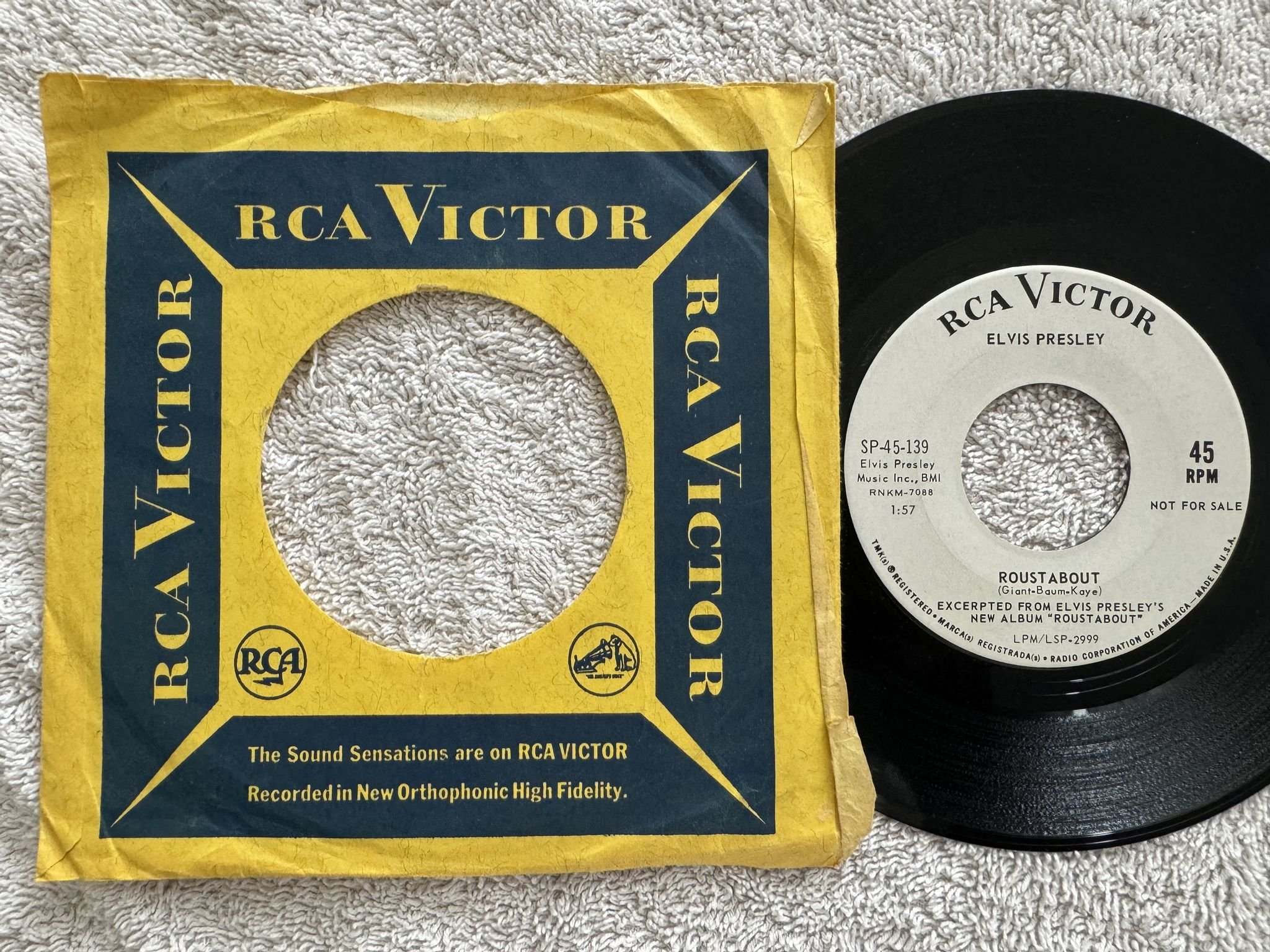 Omslagsbild för skivan ELVIS PRESLEY roustabout 7" -64 US RCA SP-45-139 *** MEGA RARE PROMO ***