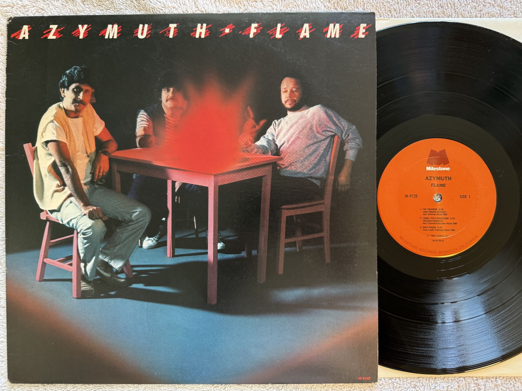 Omslagsbild för skivan AZYMUTH flame LP -84 US MILESTONE M-9128 ** LATIN JAZZ FUNK **
