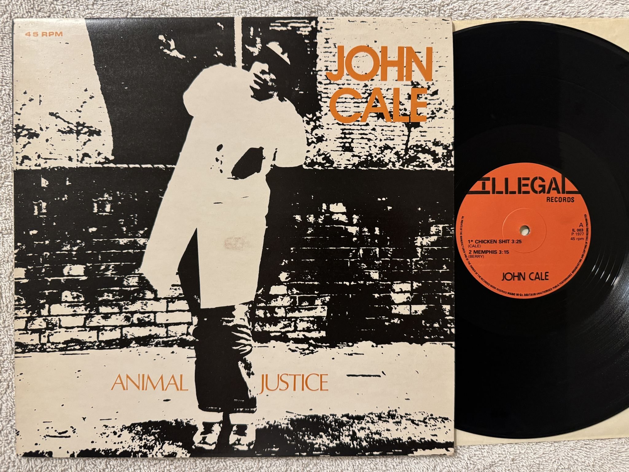 Omslagsbild för skivan JOHN CALE Animal Justice 12"ep -77 UK ILLEGAL IL003