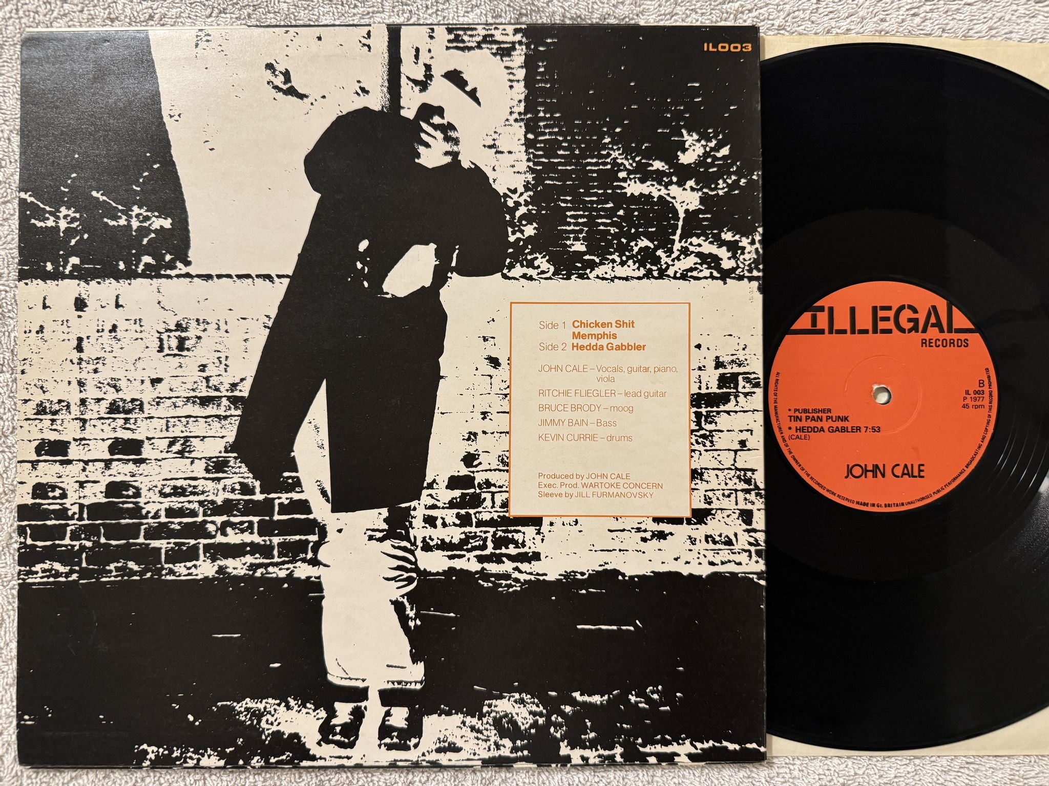 Omslagsbild för skivan JOHN CALE Animal Justice 12"ep -77 UK ILLEGAL IL003