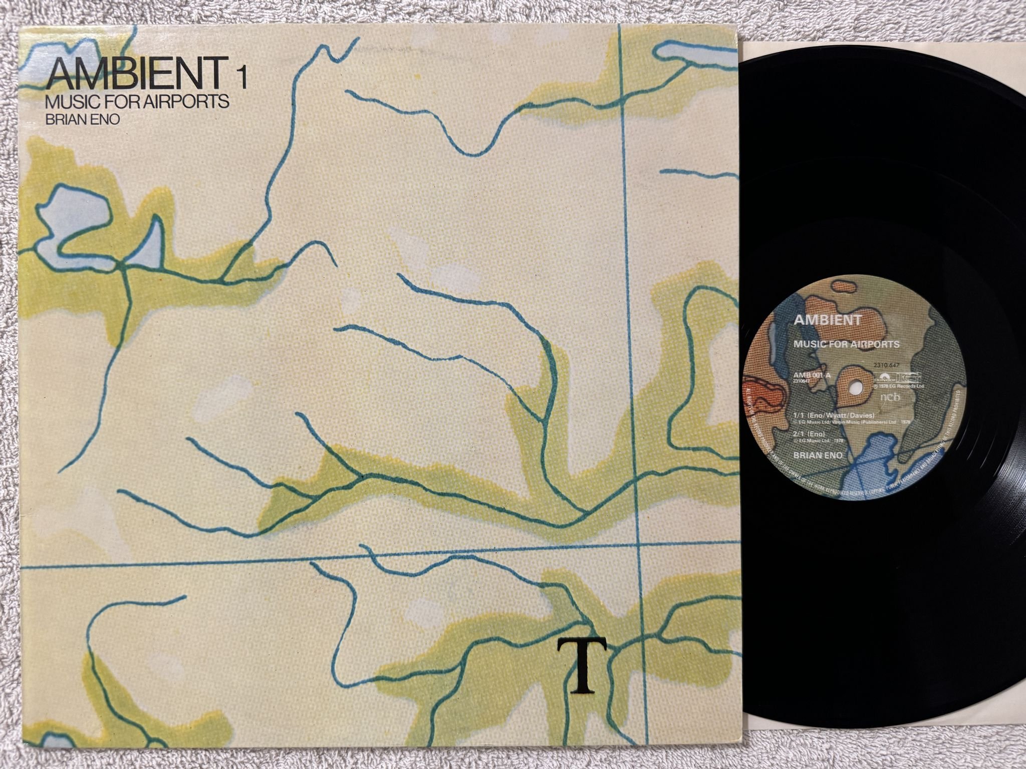 Omslagsbild för skivan BRIAN ENO ambient 1 ( music for airports ) LP -78 ncb POLYDOR 2310 647
