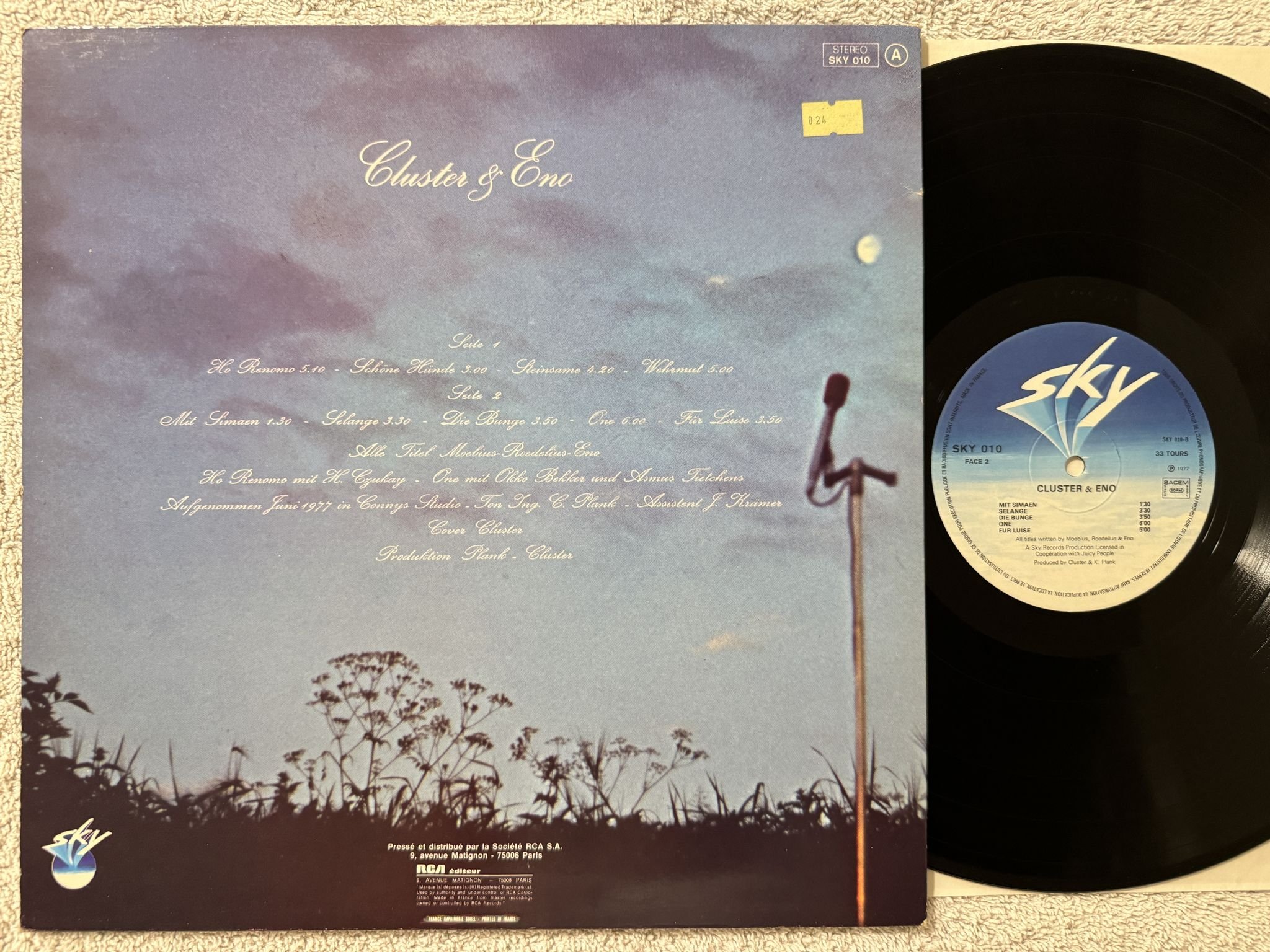 Omslagsbild för skivan CLUSTER & ENO s/t LP -77 Ger SKY 010 *** ELECTRONIC / AMBIENT ***