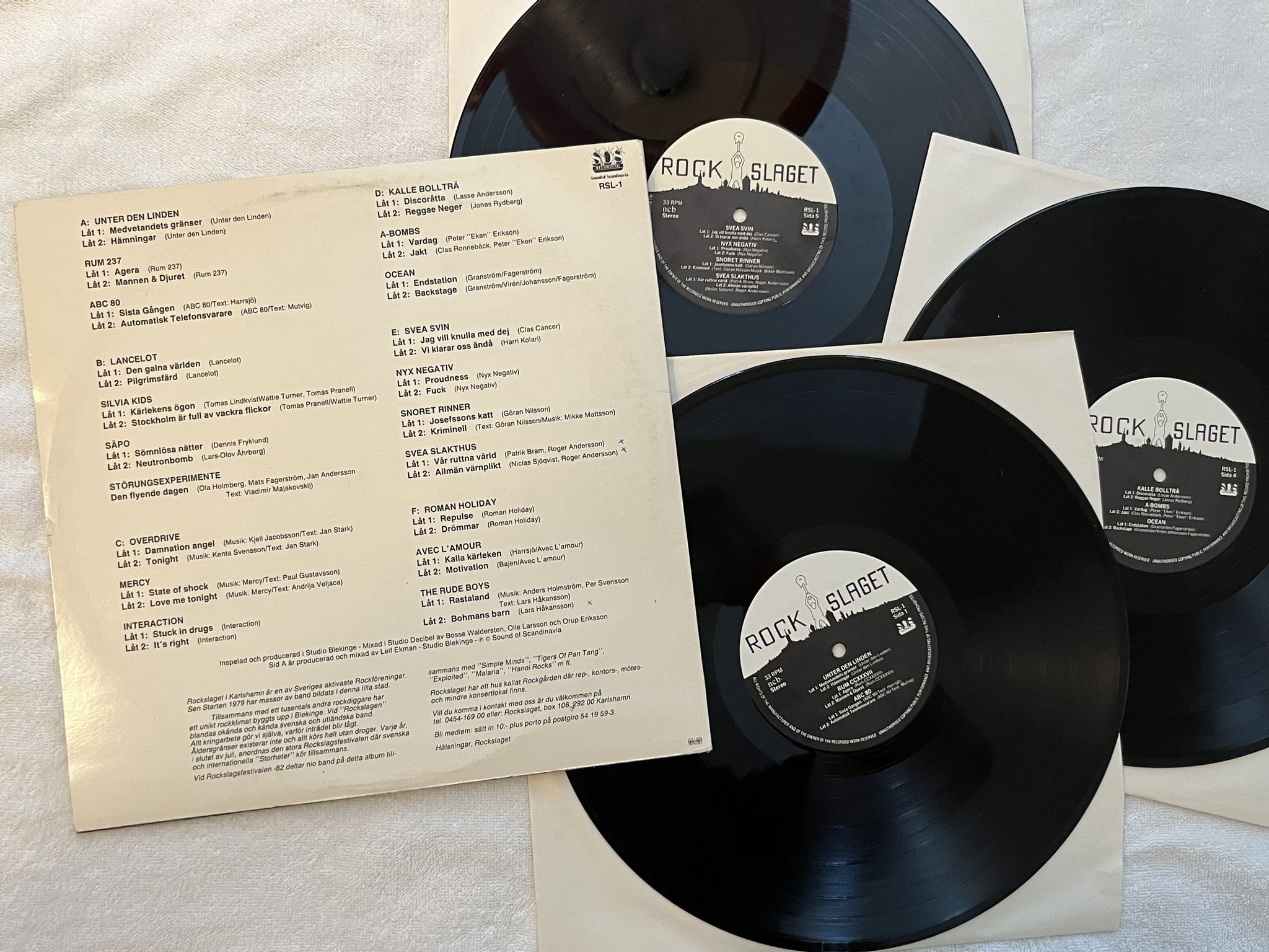 Omslagsbild för skivan V/A Rockslaget - 20 Grupper 40 Låtar 3xLP -81 RSL-1 ** UNDERBAR SAMLING **