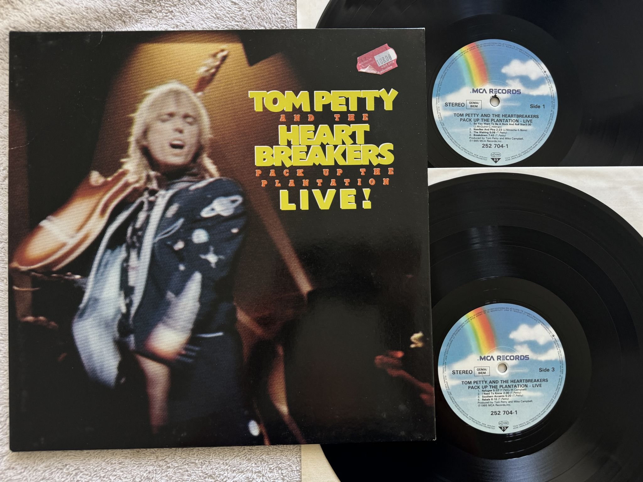 Omslagsbild för skivan TOM PETTY AND THE HEARTBREAKERS pack up the plantation 2xLP -85 MCA 252 704-1