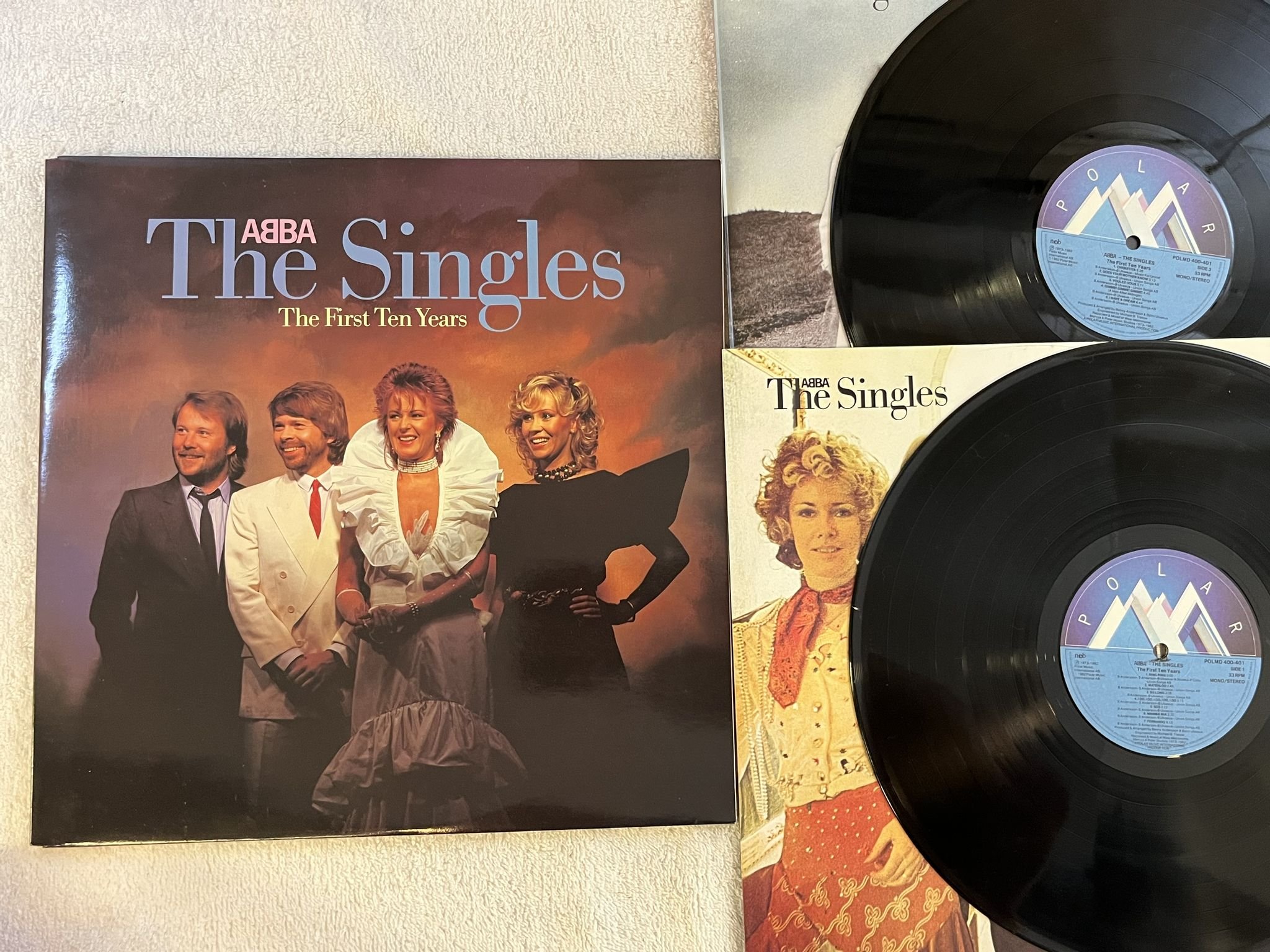 Omslagsbild för skivan ABBA The Singles (The First Ten Years) 2xLP -82 Swe POLAR POLMD 400-401 promo