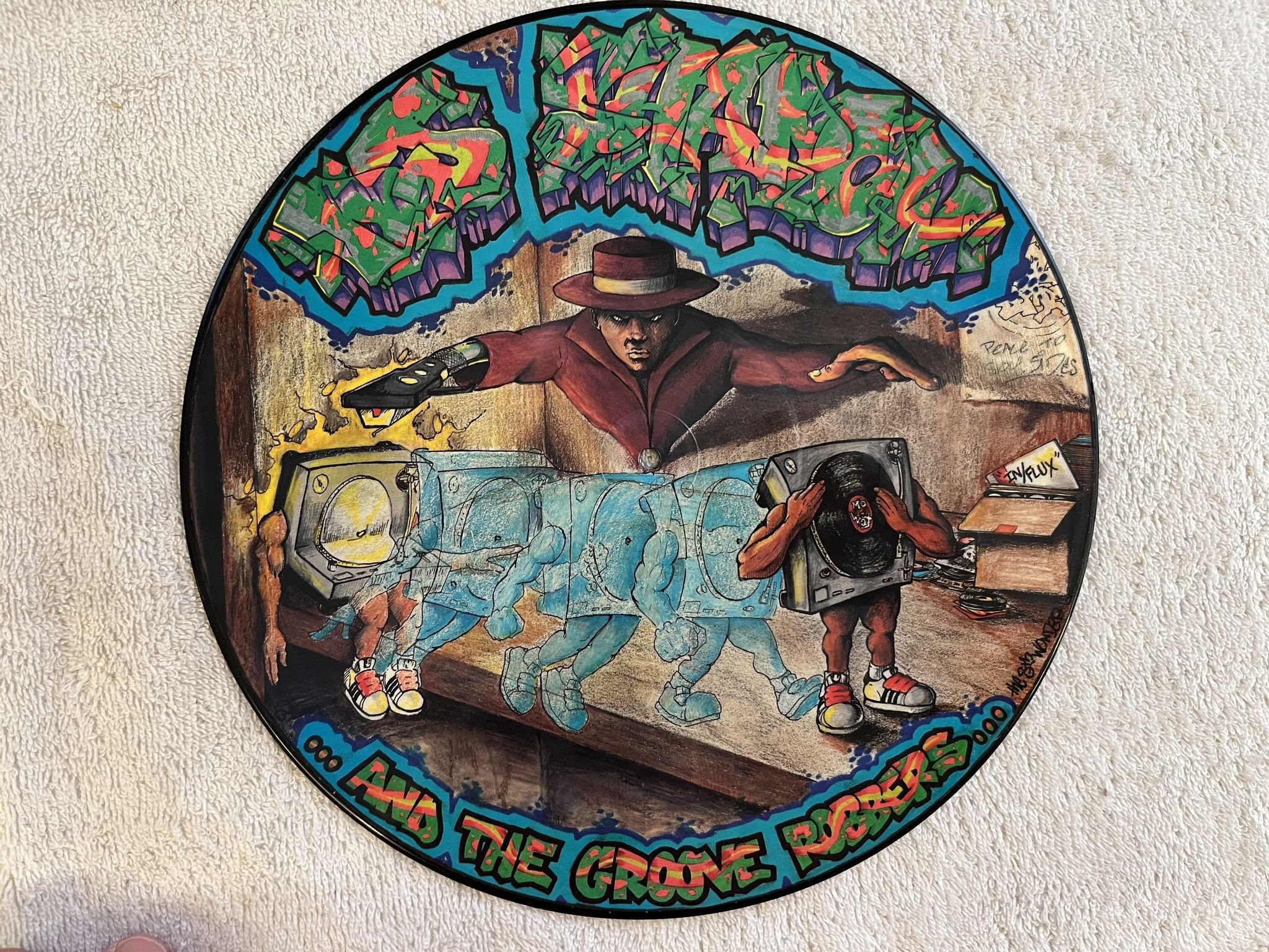 Omslagsbild för skivan DJ Shadow .. And The Groove Robbers... – In/Flux 12" UK -93 MO WAX MW 014