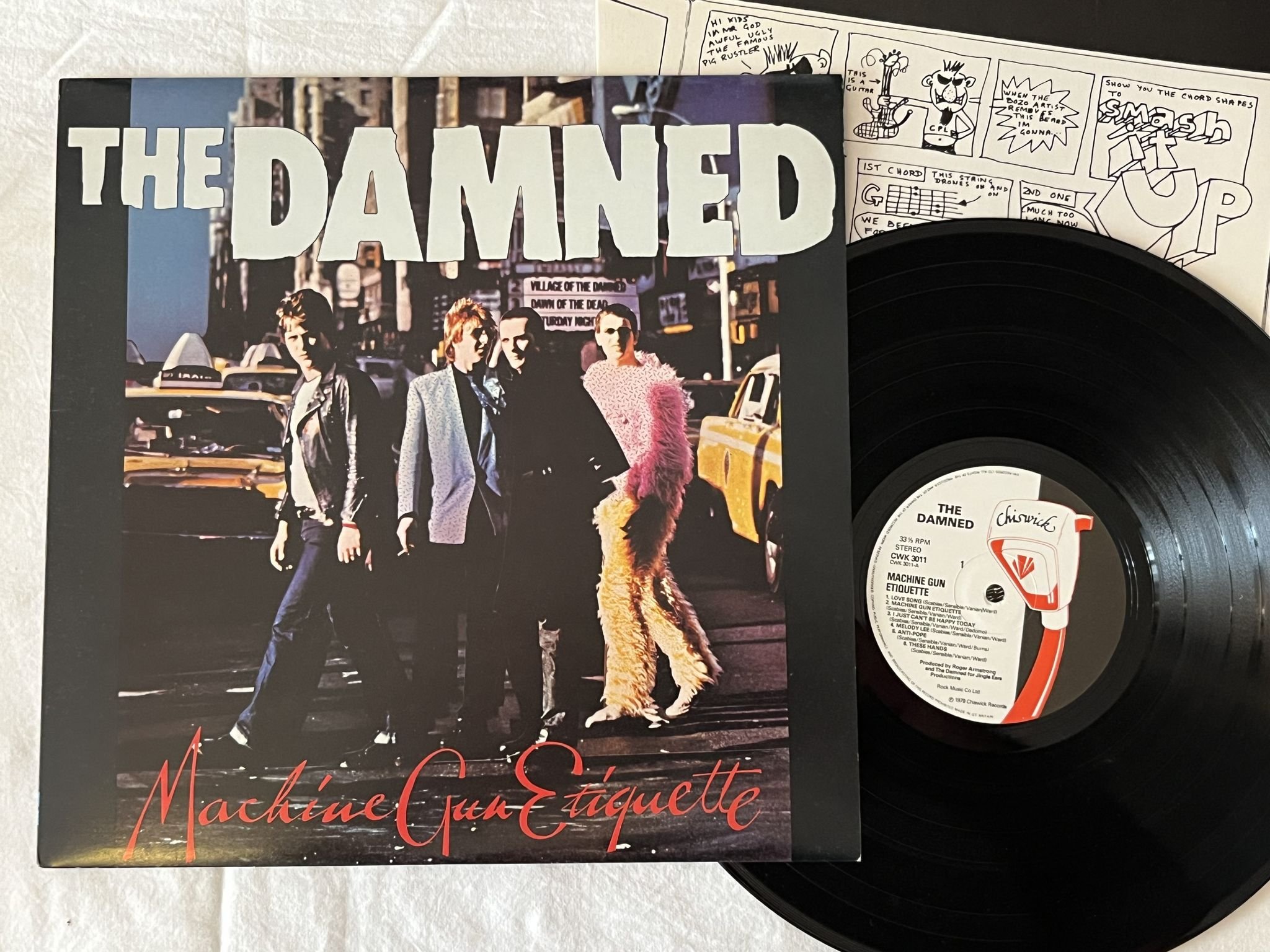Omslagsbild för skivan THE DAMNED Machine Gun Etiquette LP -79 UK CHISWICK CWK 3011 *** PUNK ROCK ***