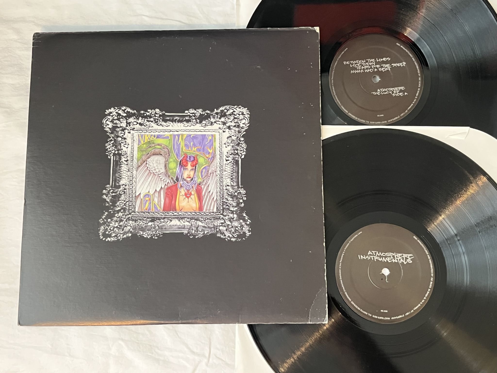 Omslagsbild för skivan ATMOSPHERE The Lucy 2xLP 2001 US Rhymesayers Entertainment – RS2005-1