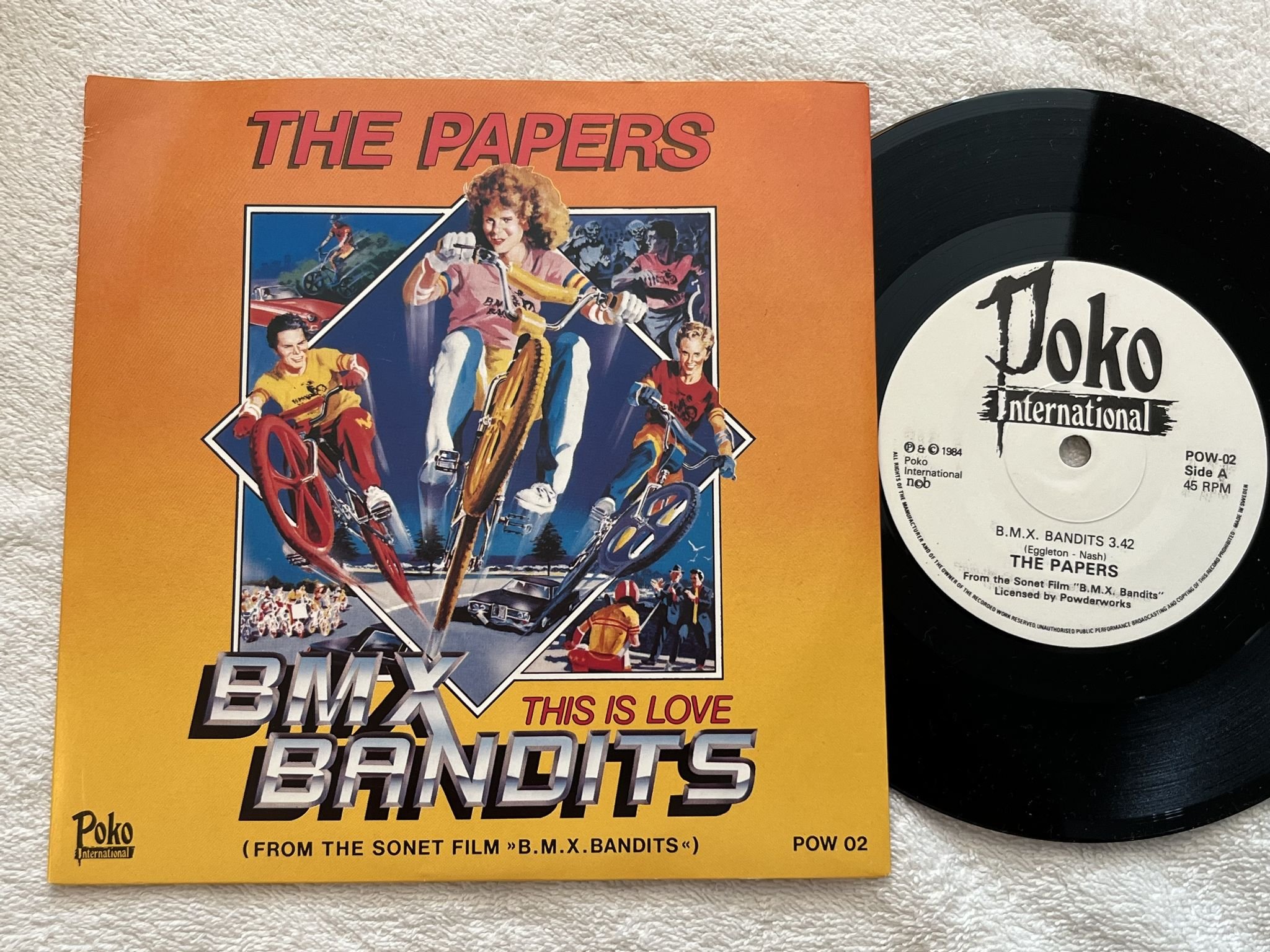 Omslagsbild för skivan THE PAPERS b.m.x. bandits 7" -84 ncb POKO POW-02
