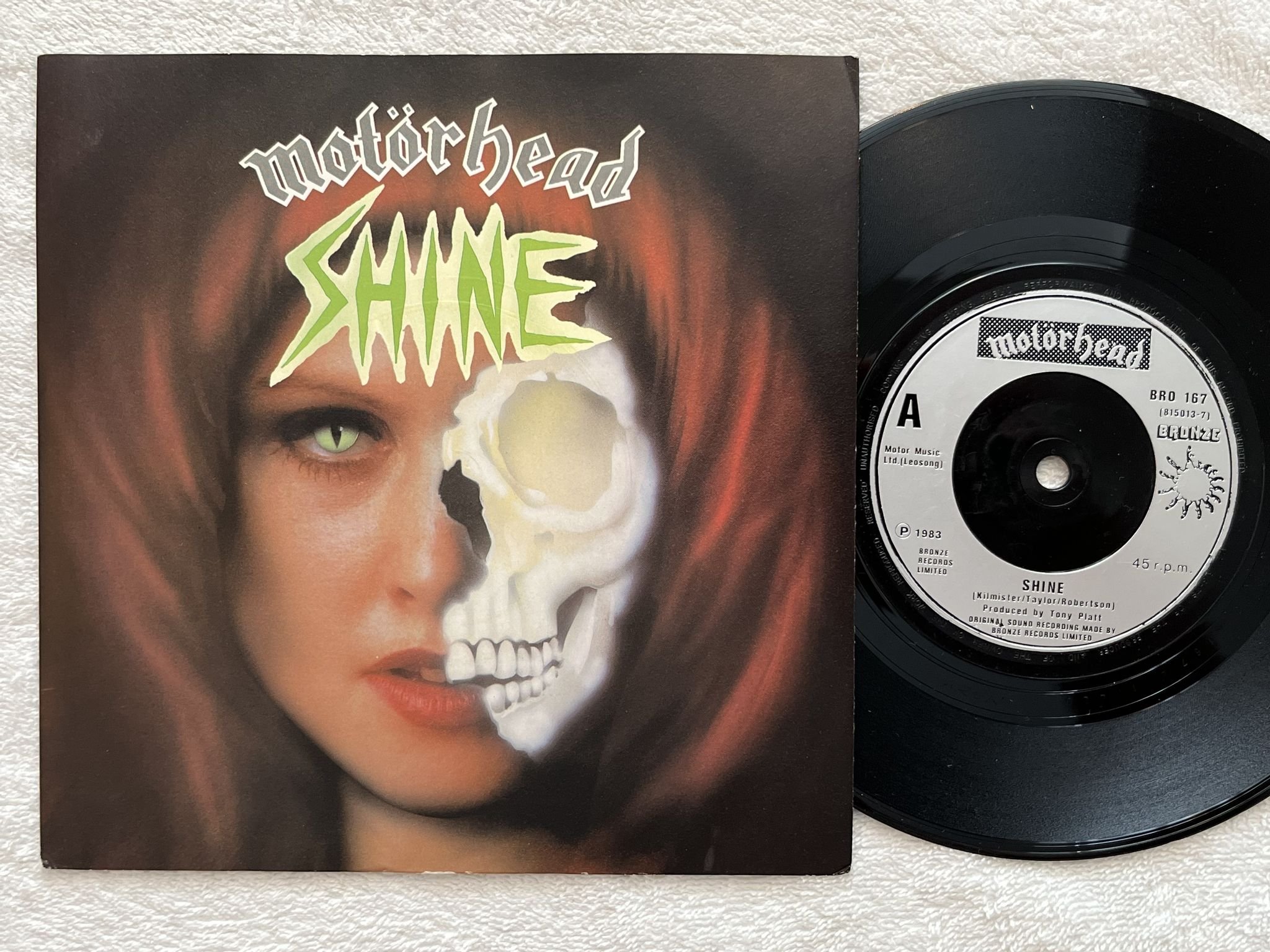 Omslagsbild för skivan MOTÖRHEAD shine 7" -83 BRONZE BRO 167*** Hard rock ***