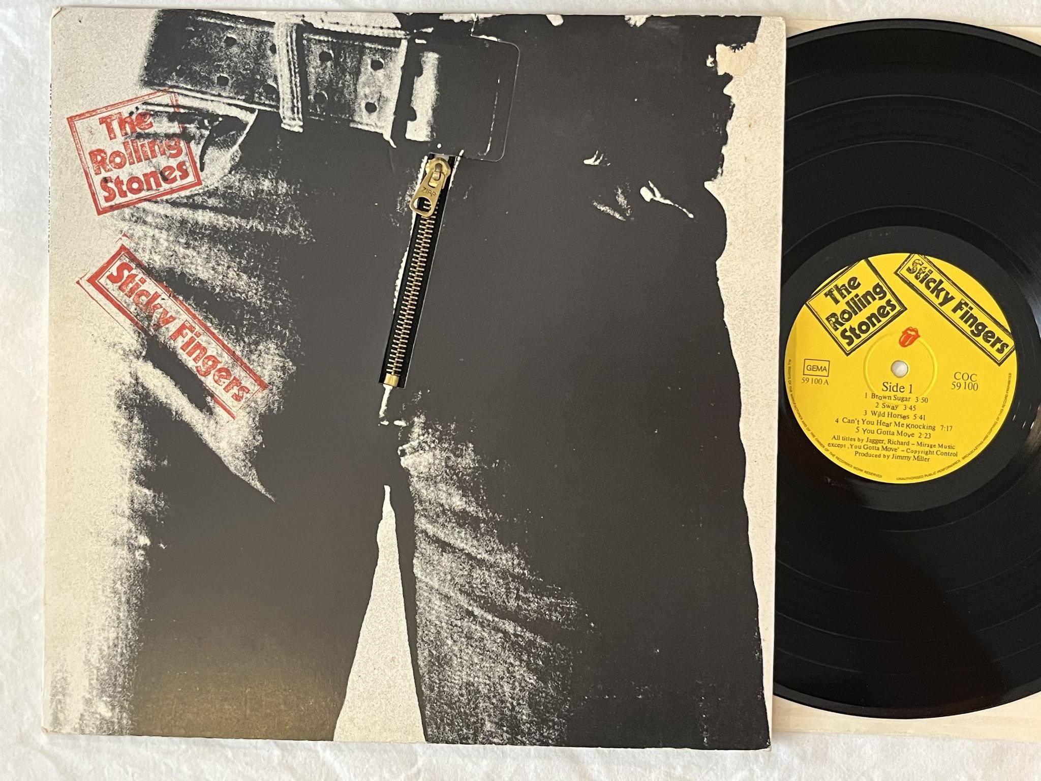Omslagsbild för skivan THE ROLLING STONES sticky fingers LP Ger COC 59100 *** Andy Warjol Pop Art ***