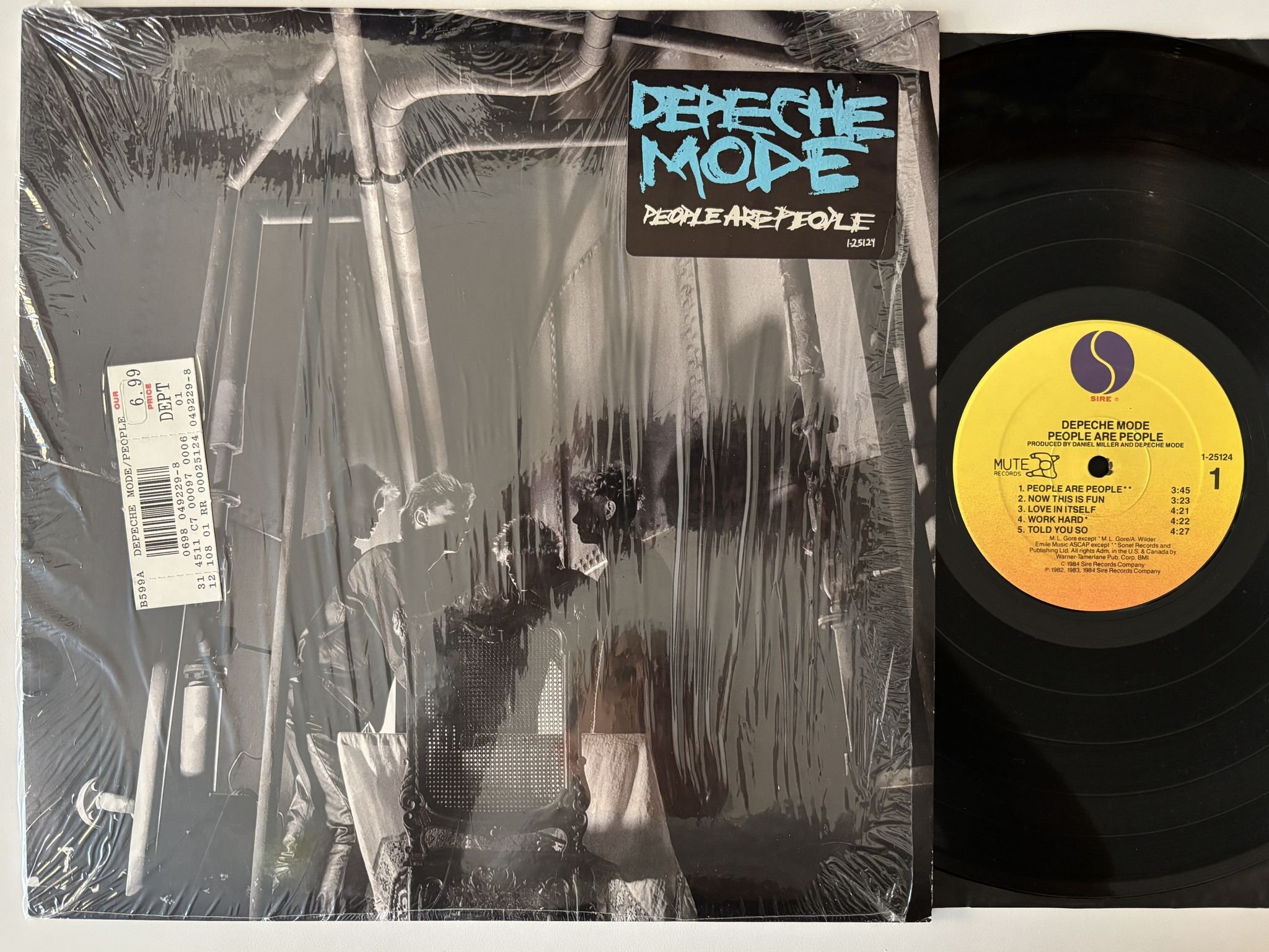 Omslagsbild för skivan DEPECHE MODE People Are People LP -84 US SIRE 1-25124 ** Hype Sticker **