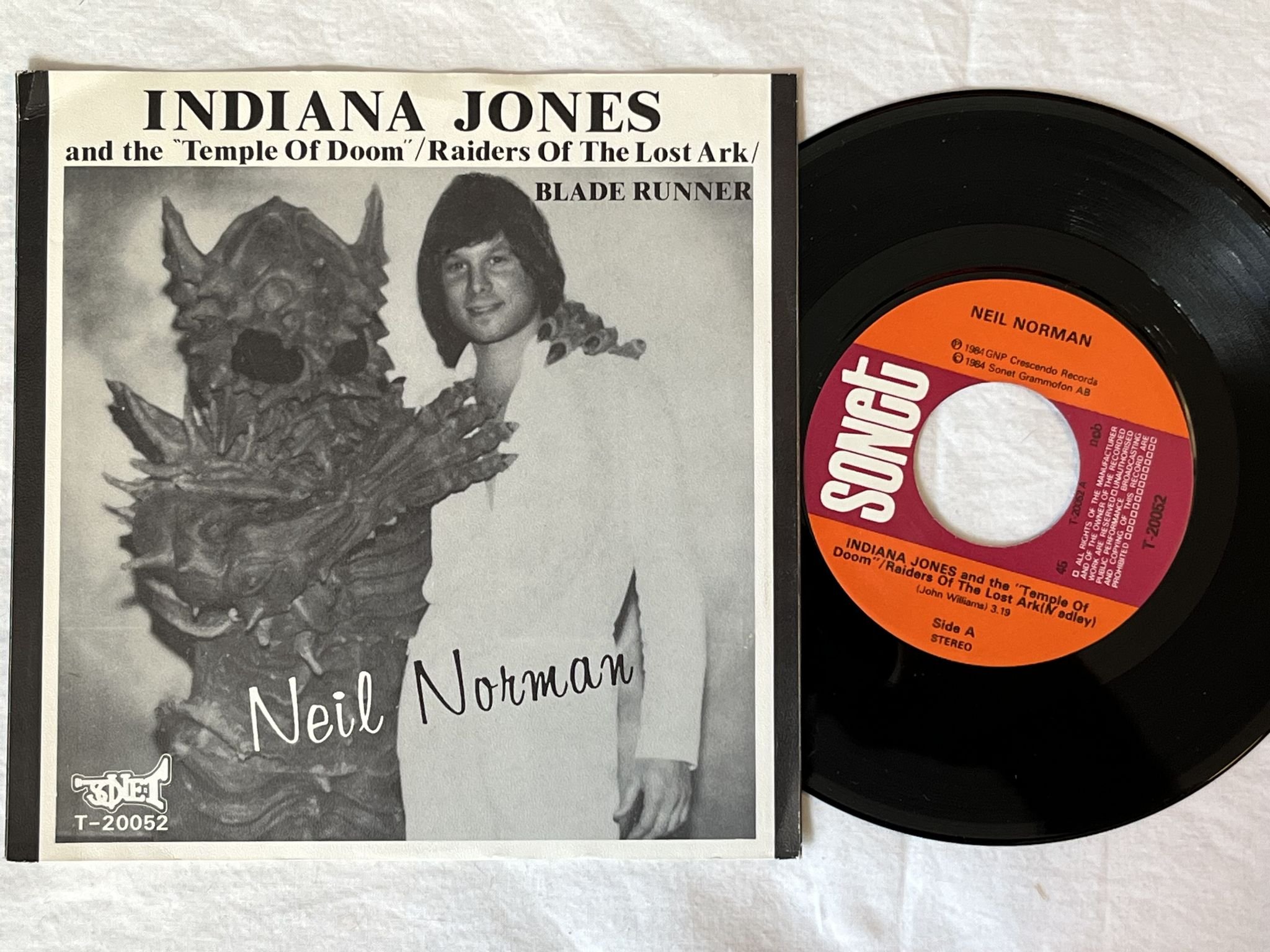 Omslagsbild för skivan NEIL NORMAN Indiana Jones And The "Temple Of Doom 7" -84 sonet T-20052