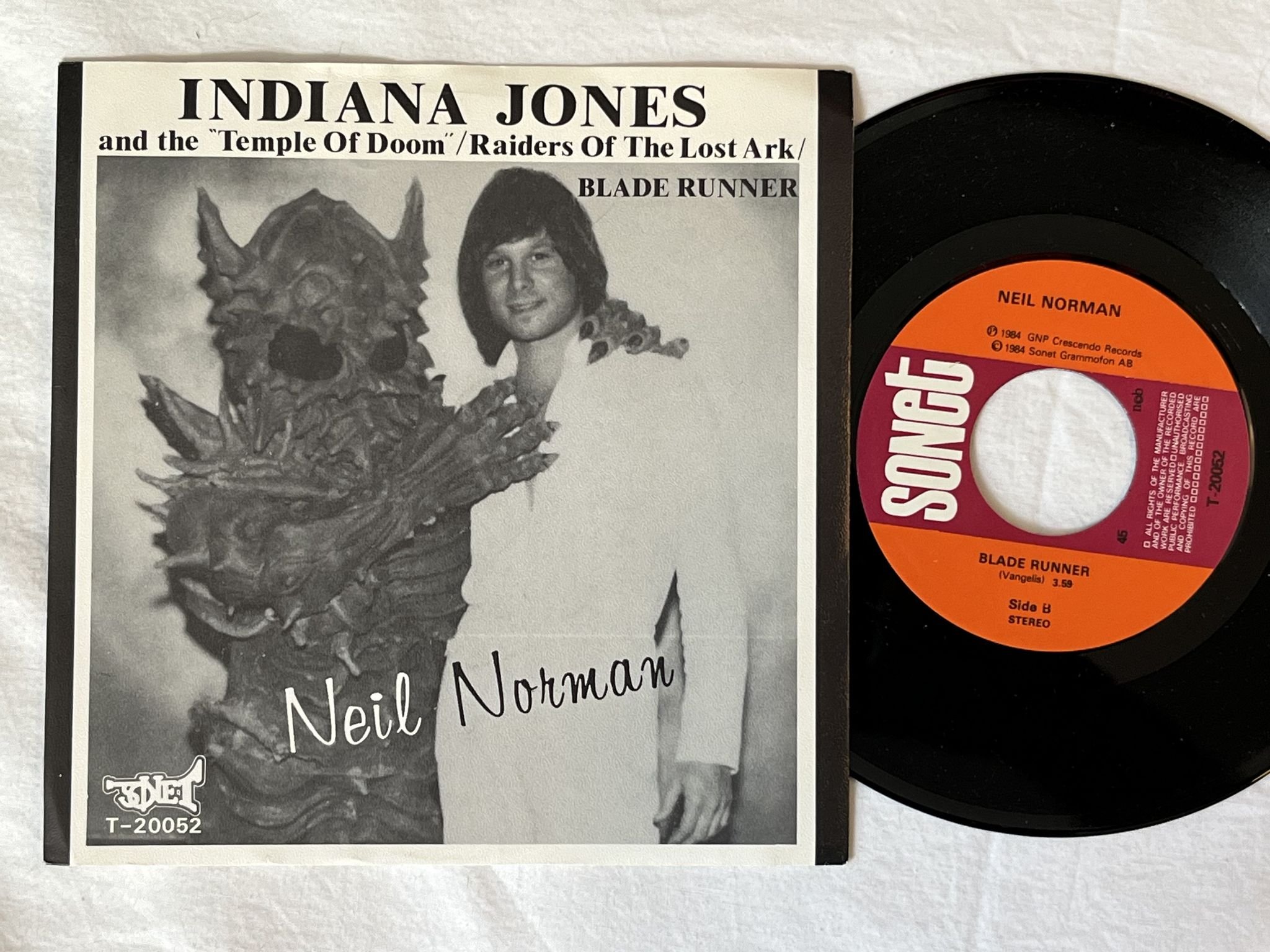 Omslagsbild för skivan NEIL NORMAN Indiana Jones And The "Temple Of Doom 7" -84 sonet T-20052