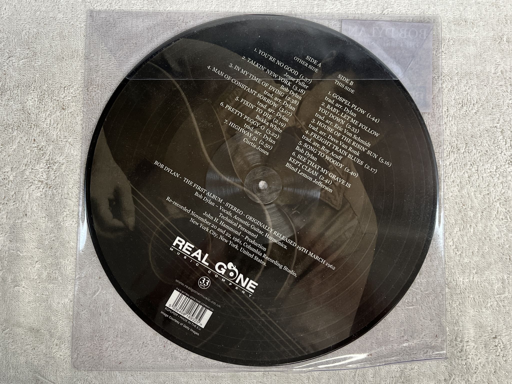 Omslagsbild för skivan BOB DYLAN The First Album LP 2017 Picture disc RGMLP009