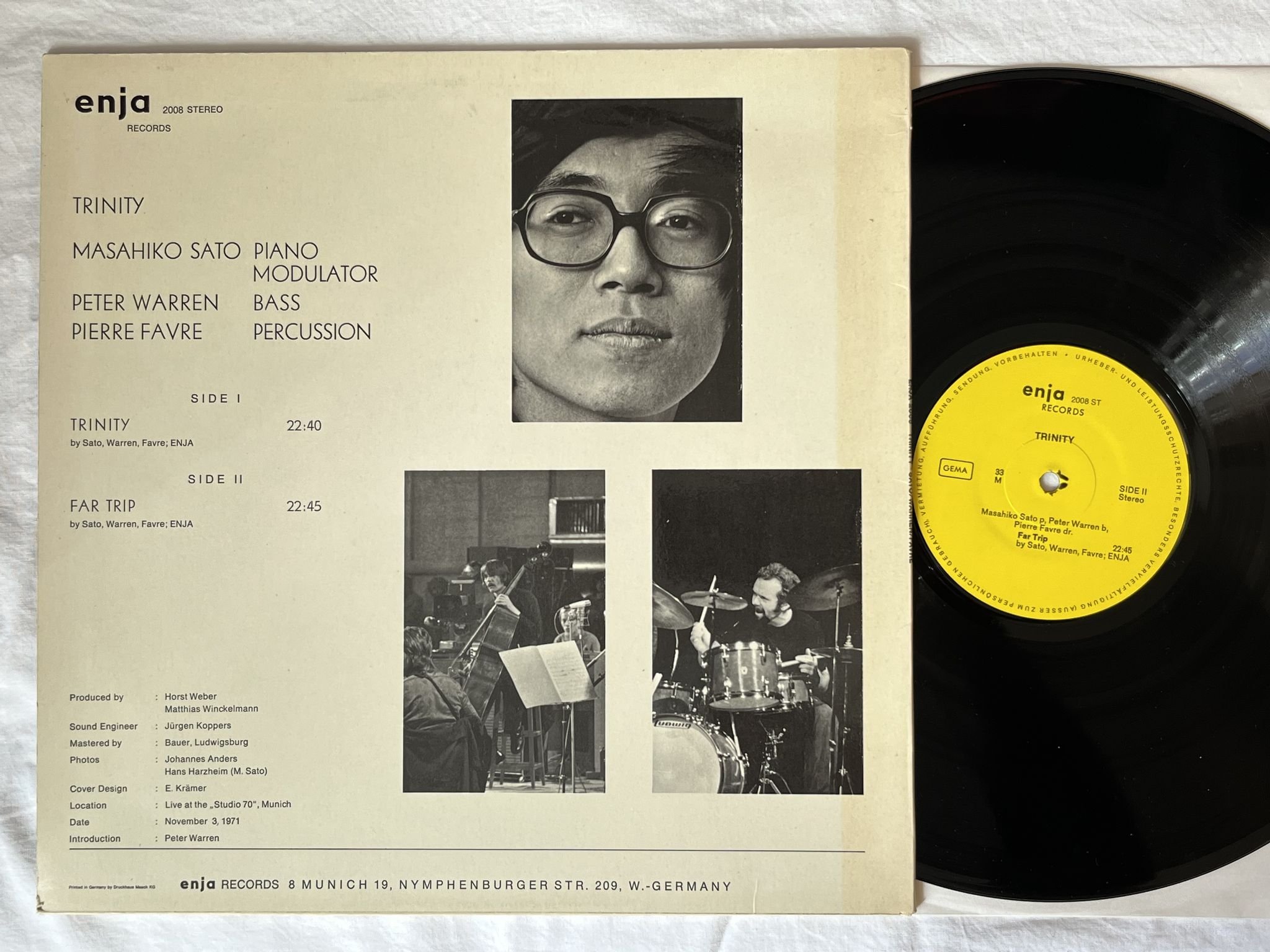 Omslagsbild för skivan Masahiko Sato, Peter Warren, Pierre Favre – Trinity LP -71 Ger enja 2008 ST