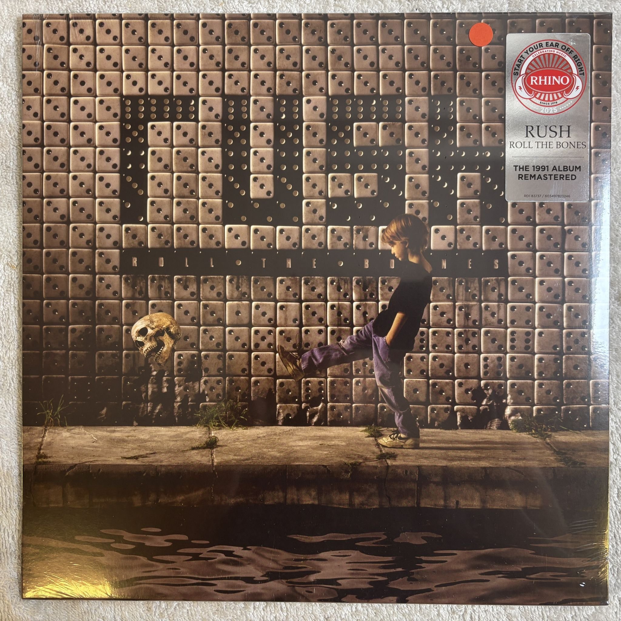 Omslagsbild för skivan RUSH Roll The Bones LP Atlantic RD1 83737