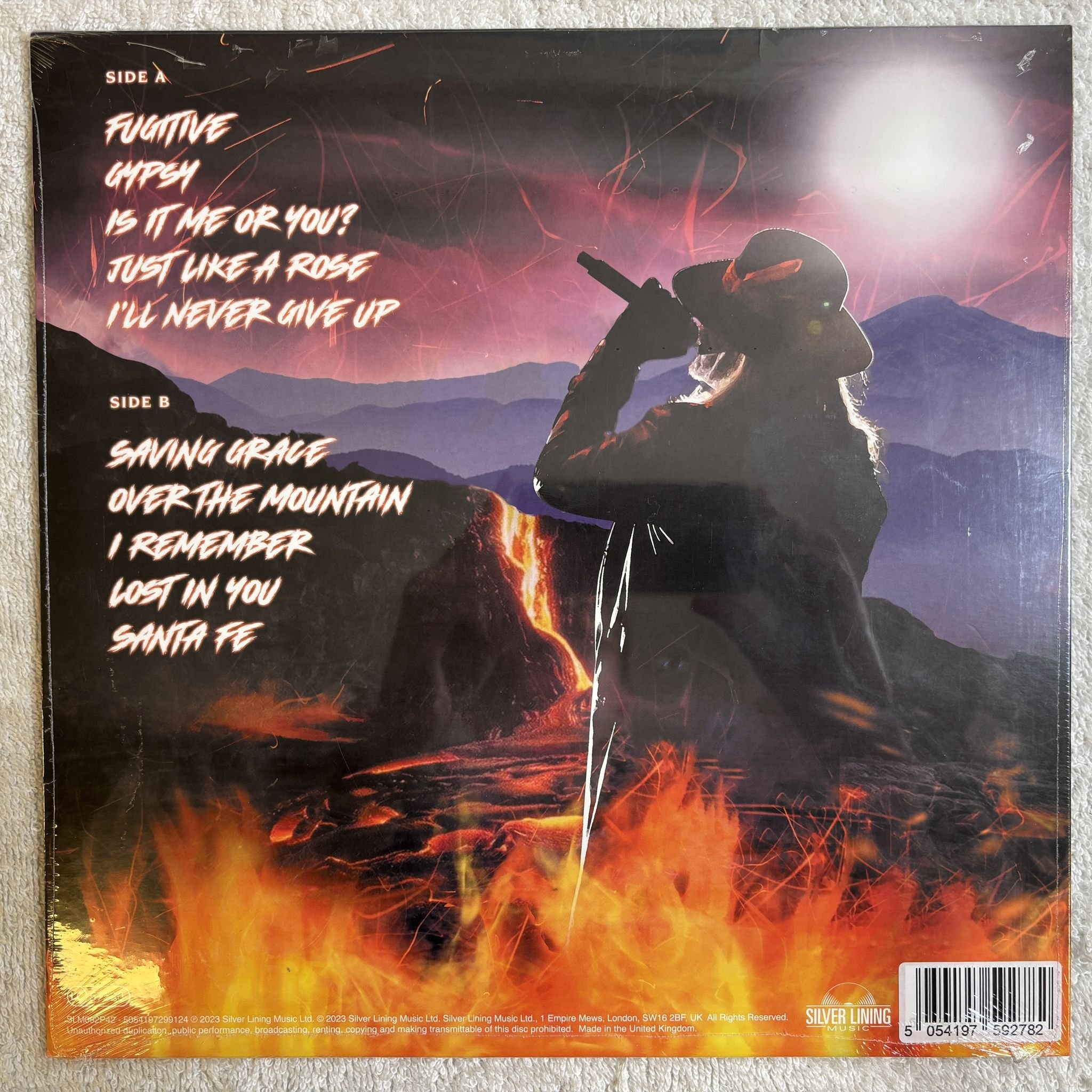 Omslagsbild för skivan DOKKEN Heaven Comes Down LP -2023 Silver Lining Music – SLM092P42