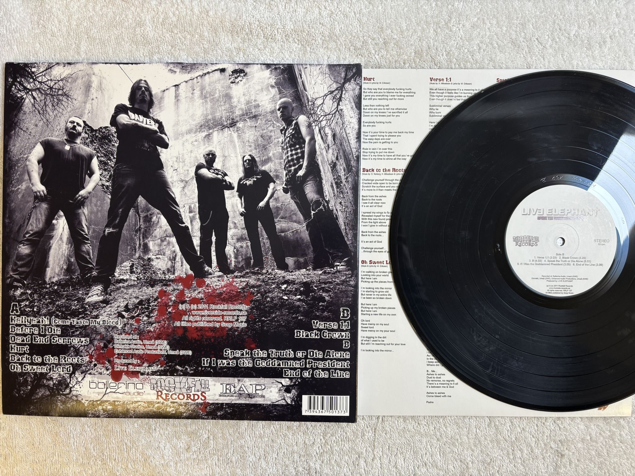 Omslagsbild för skivan LIVE ELEPHANT Speak The Truth Or Die Alone LP- 2011 Rockfall Records RRLP 137