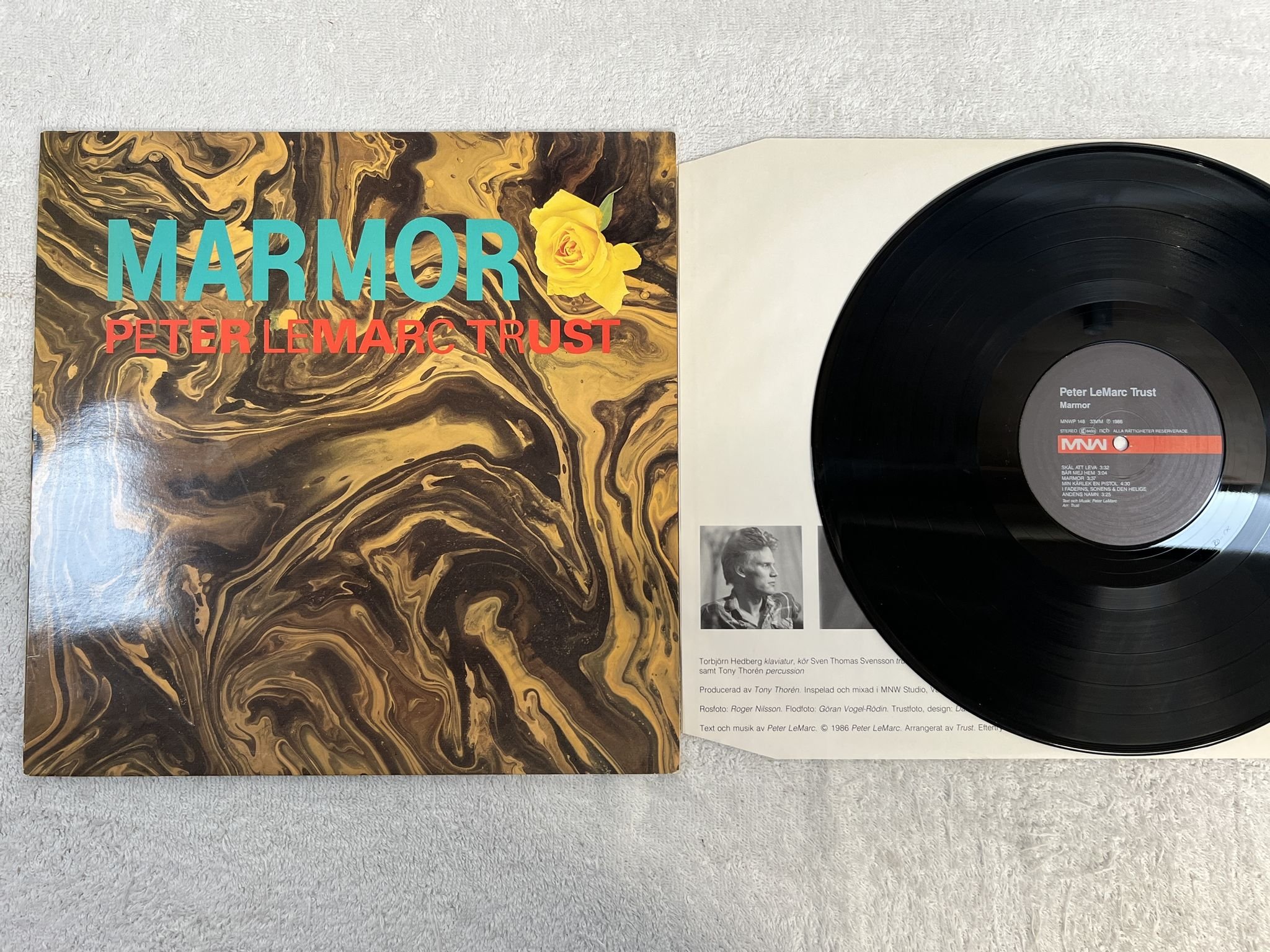 Omslagsbild för skivan PETER LEMARC TRUST Marmor LP -86 Swe MNW MNWP 148