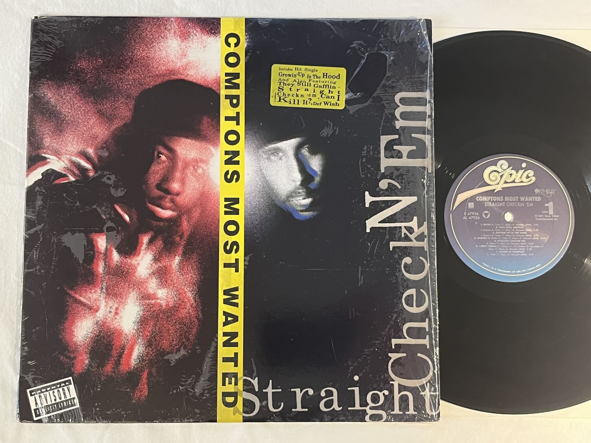 Omslagsbild för skivan COMPTONS MOST WANTED Straight Checkn 'Em LP -91 US EPIC E 47926