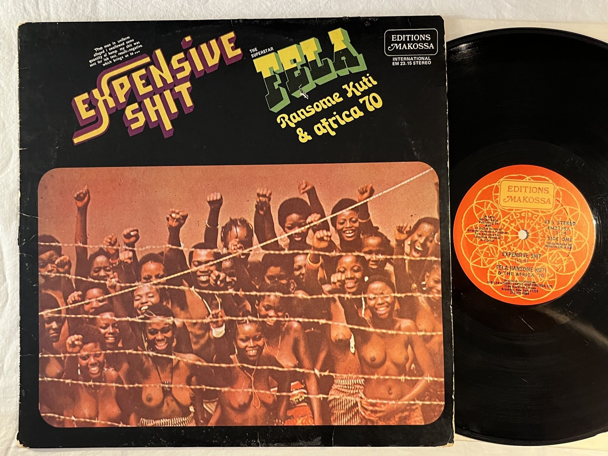 Omslagsbild för skivan FELA KUTI & THE AFRICA 70 Expensive shit LP -75 US ED MAKOSSA EM2315 rare afro !
