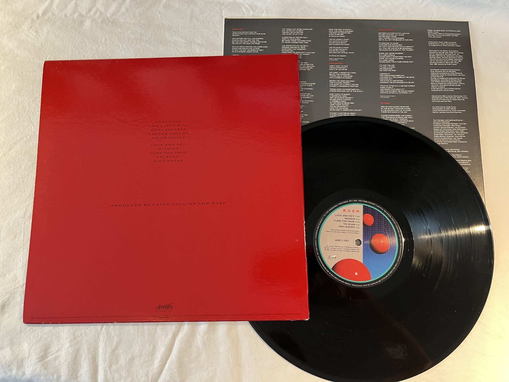 Omslagsbild för skivan RUSH hold your fire LP -87 Can ANTHEM ANR-1-1051