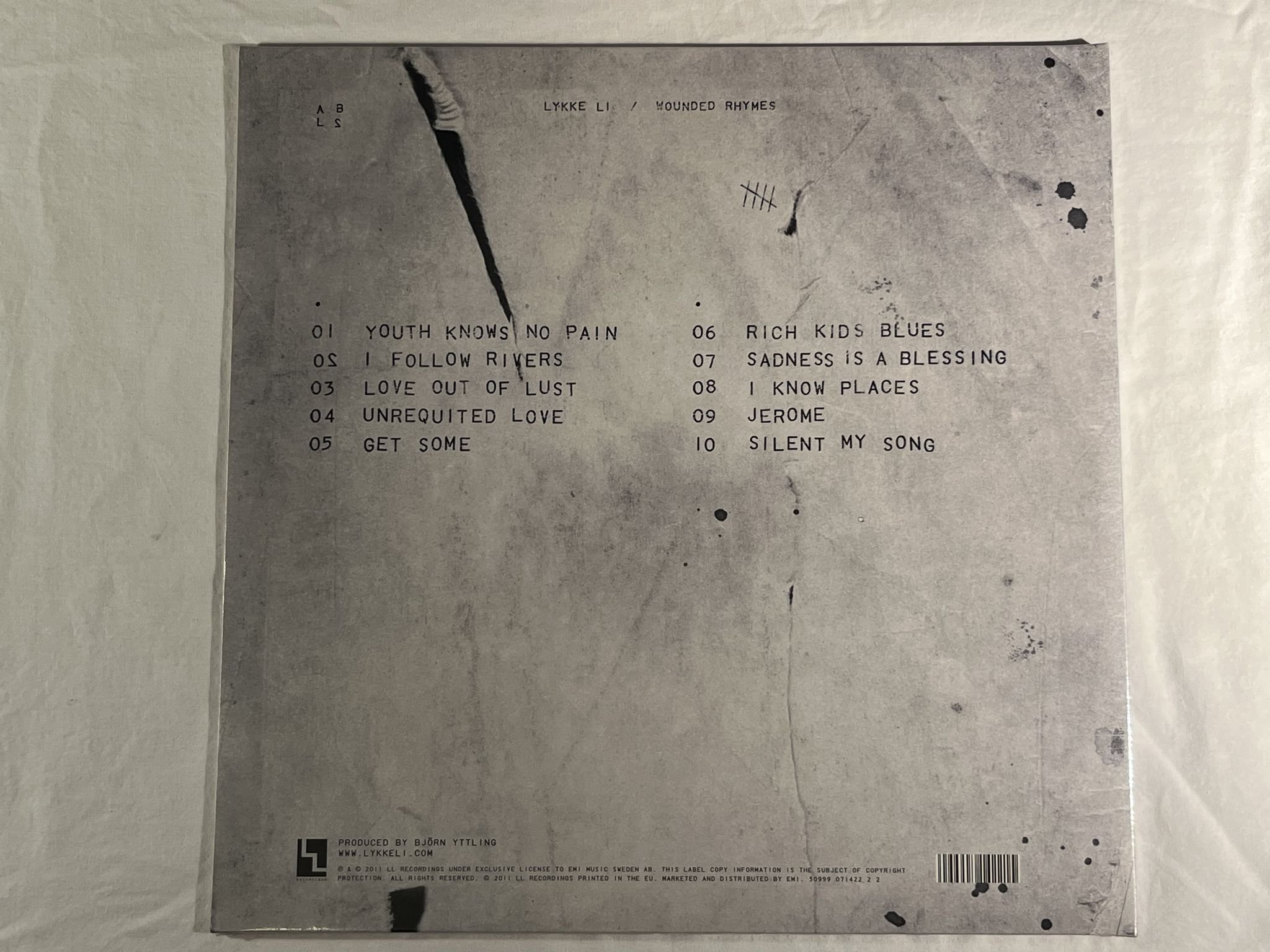 Omslagsbild för skivan LYKKE LI Wounded Rhymes LP 2011 LL Recordings 50999 071422 1 5 ** SEALED **