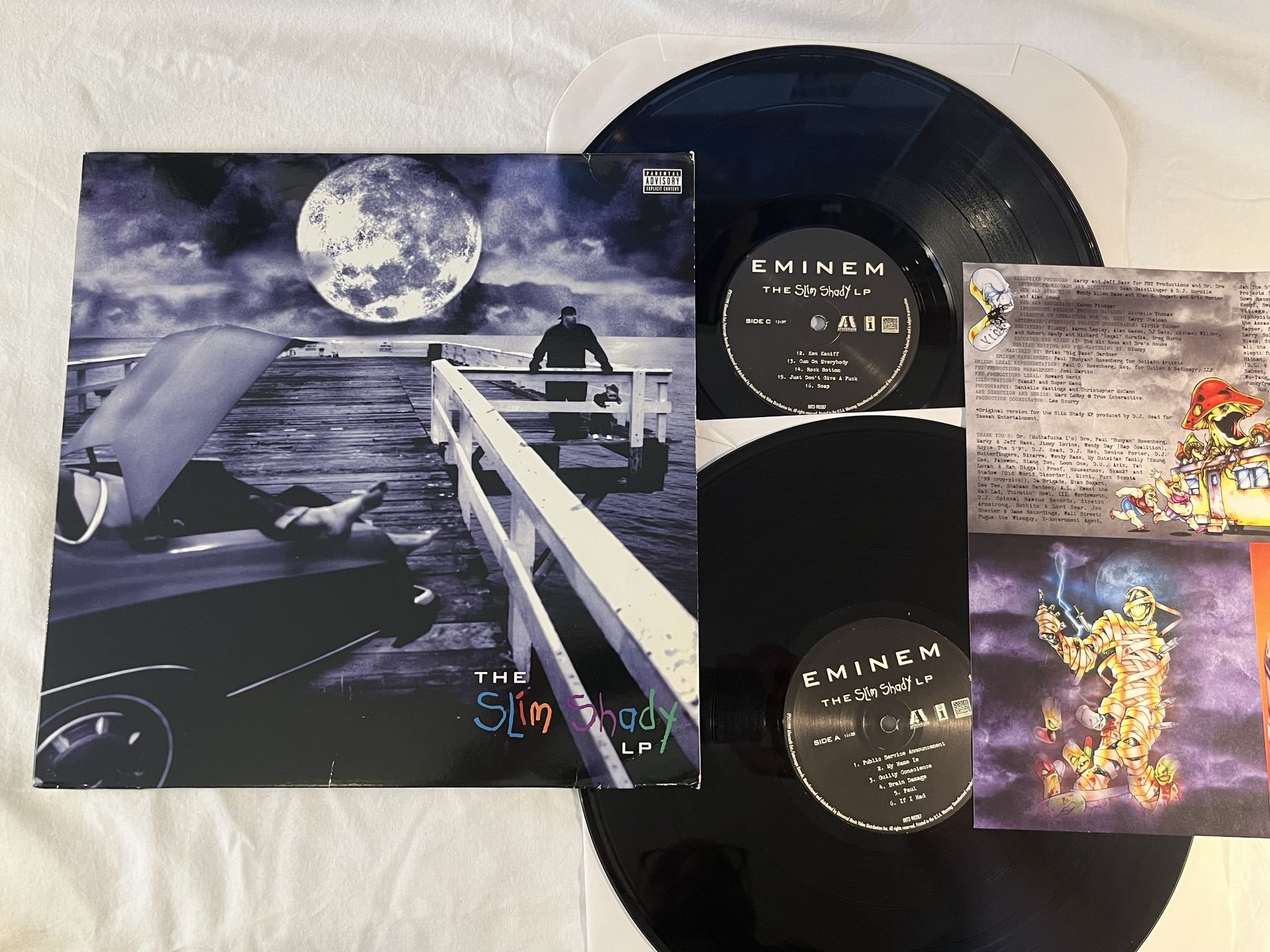 Omslagsbild för skivan EMINEM The Slim Shady LP 2xLP -99 eu AFTERMATH 490 287-1 ** RARE CLASSIC **