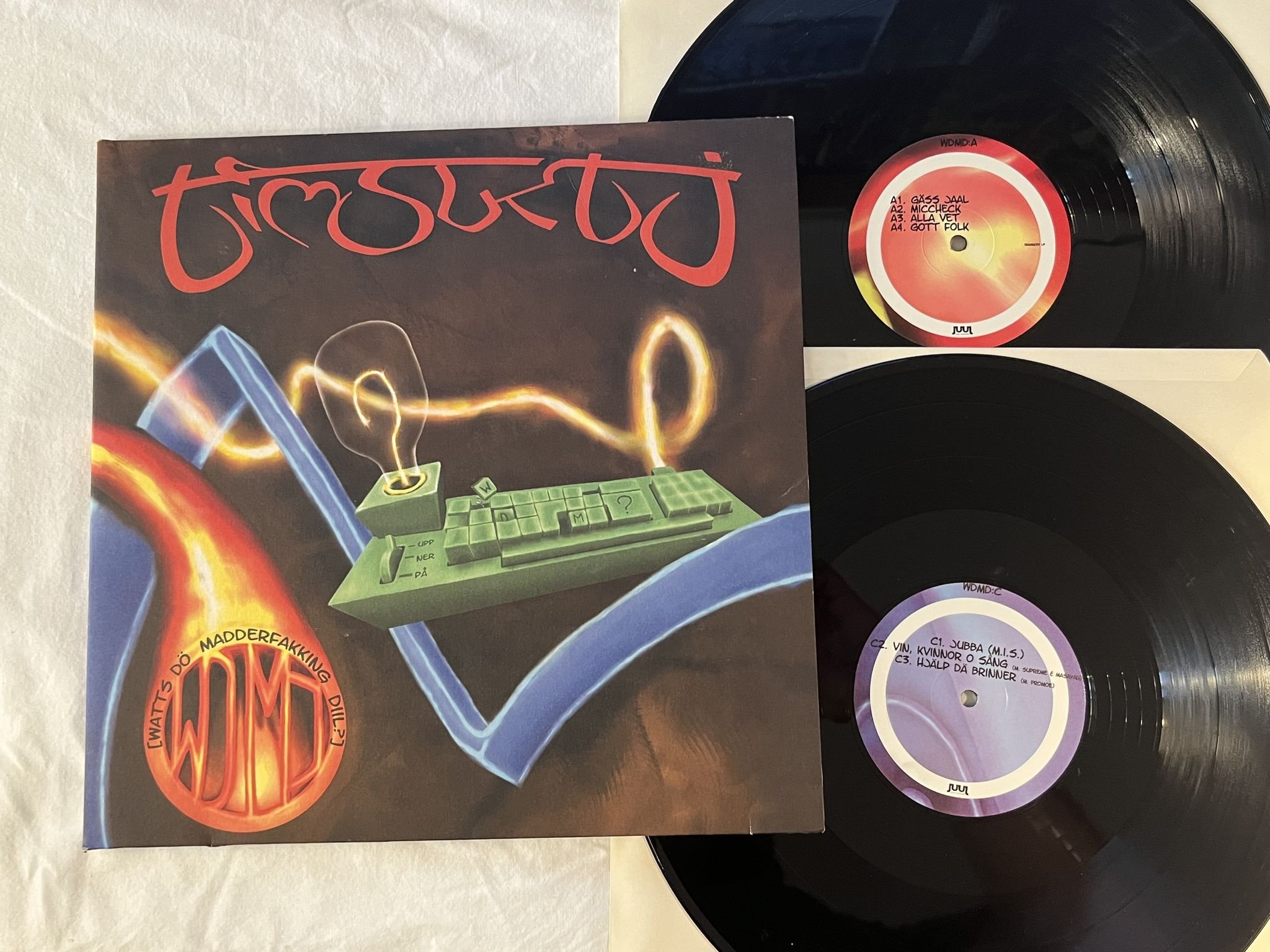 Omslagsbild för skivan TIMBUKTU Watt's Dö Madderfakking Diil? 2xLP 2002 JUJU JUJULP011