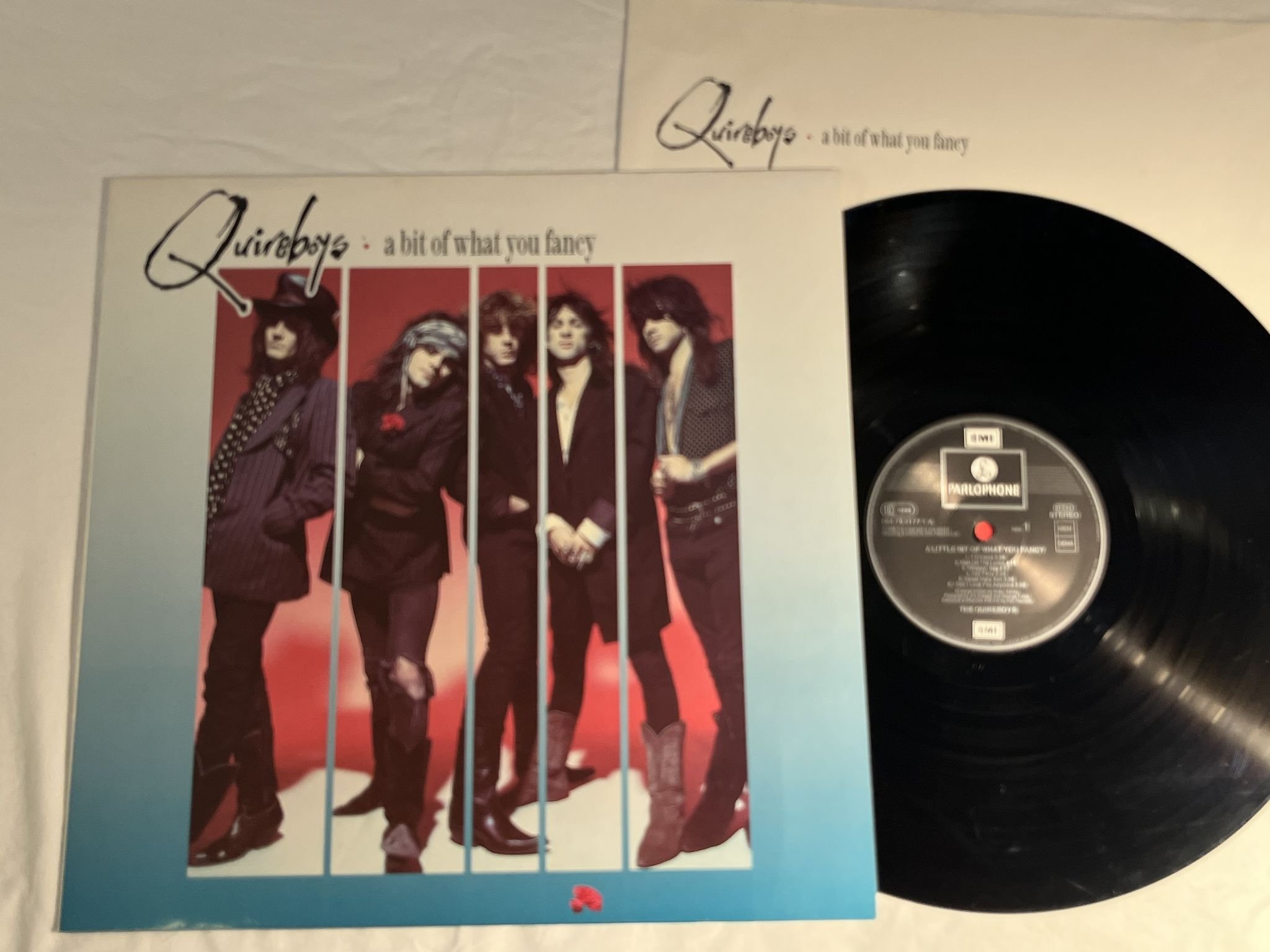 Omslagsbild för skivan THE QUIREBOYS a little of what you fancy LP -89 PARLOPHONE 064-79 3177 1