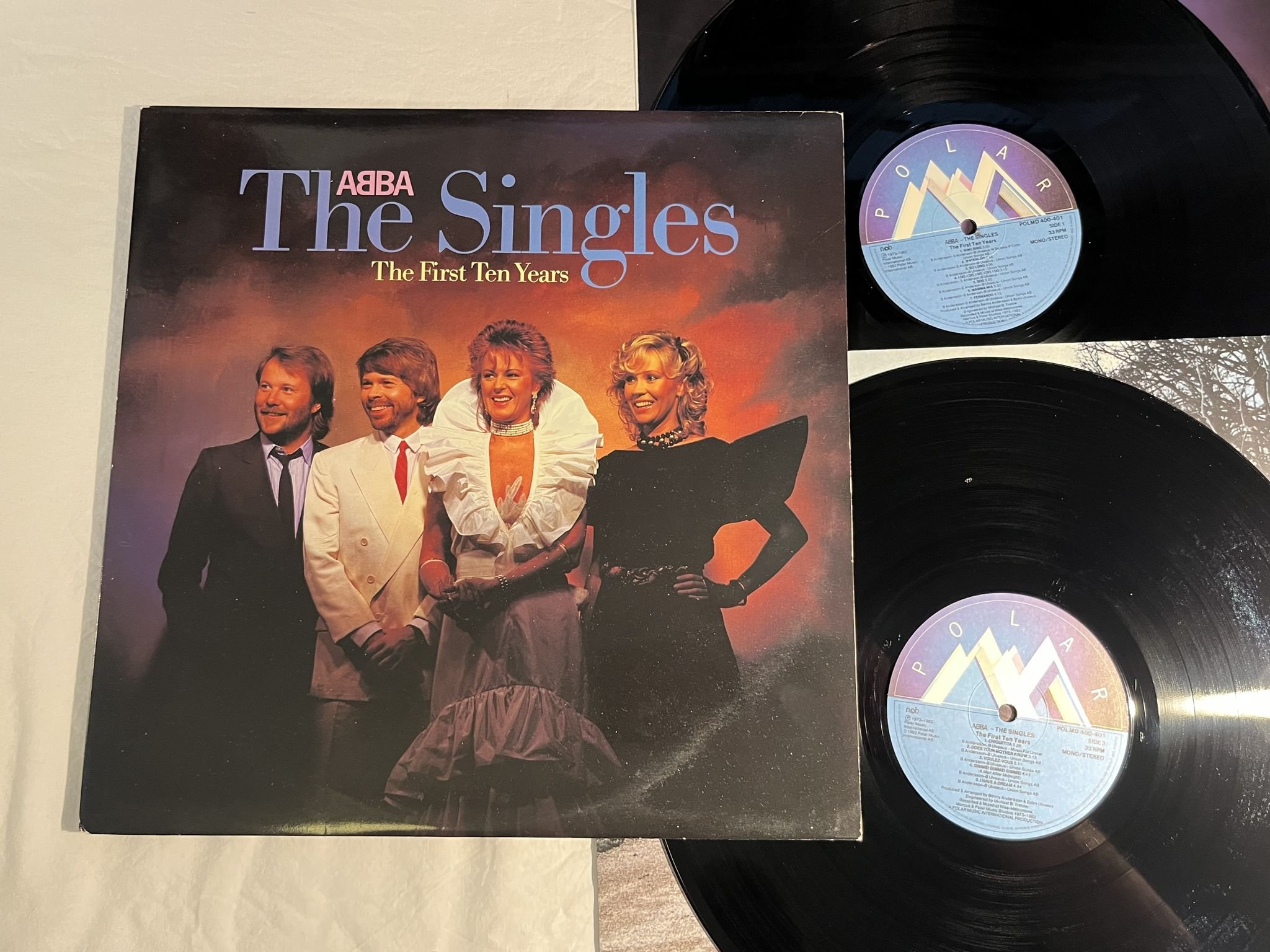Omslagsbild för skivan ABBA the singles 2xLP -82 POLAR POLMD 400-401 ** 10-ÅRSJUBILEUM **