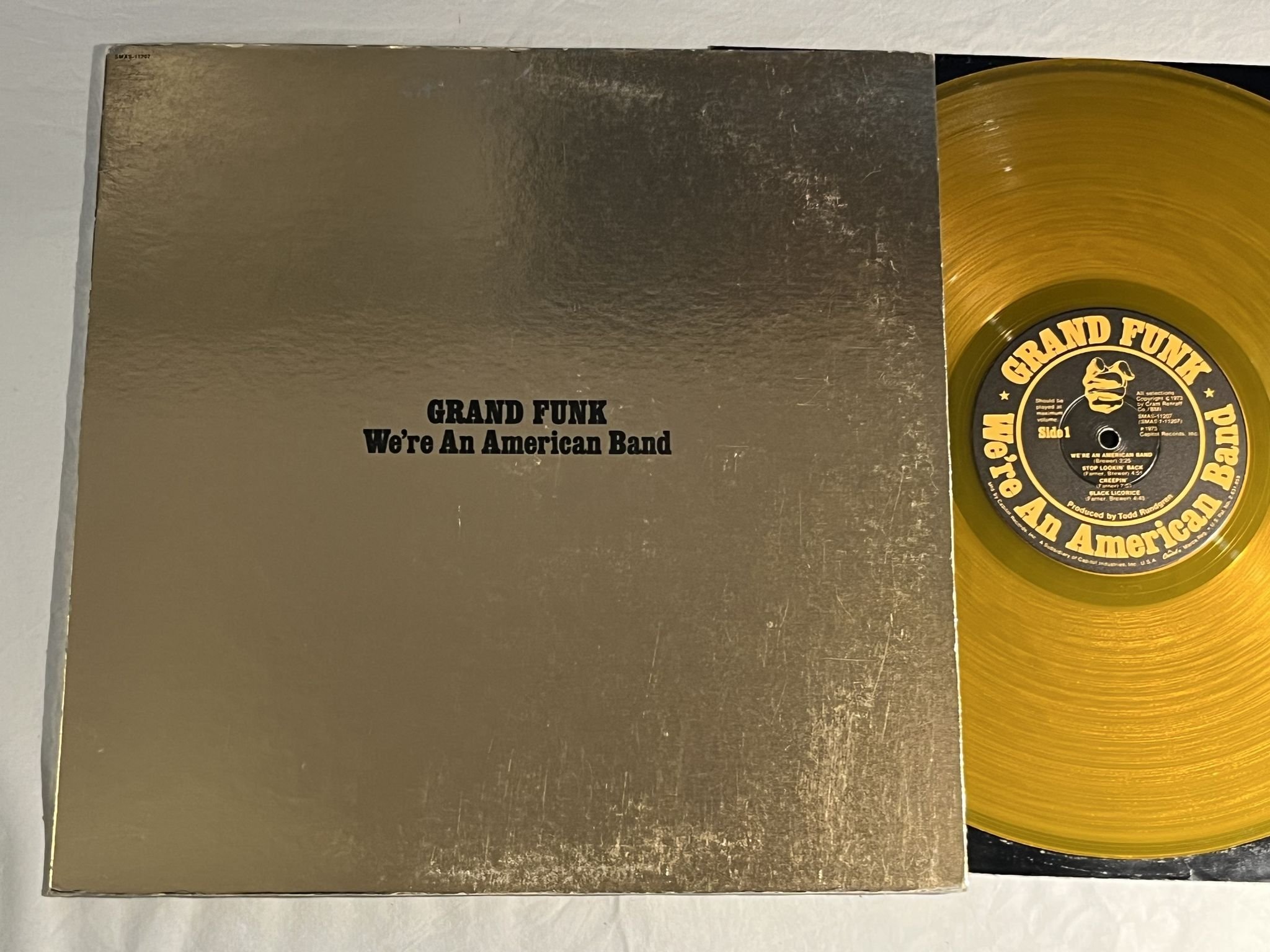 Omslagsbild för skivan GRAND FUNK we're an american band LP -73 US CAPITOL SMAS-11207 * YELLOW VINYL *
