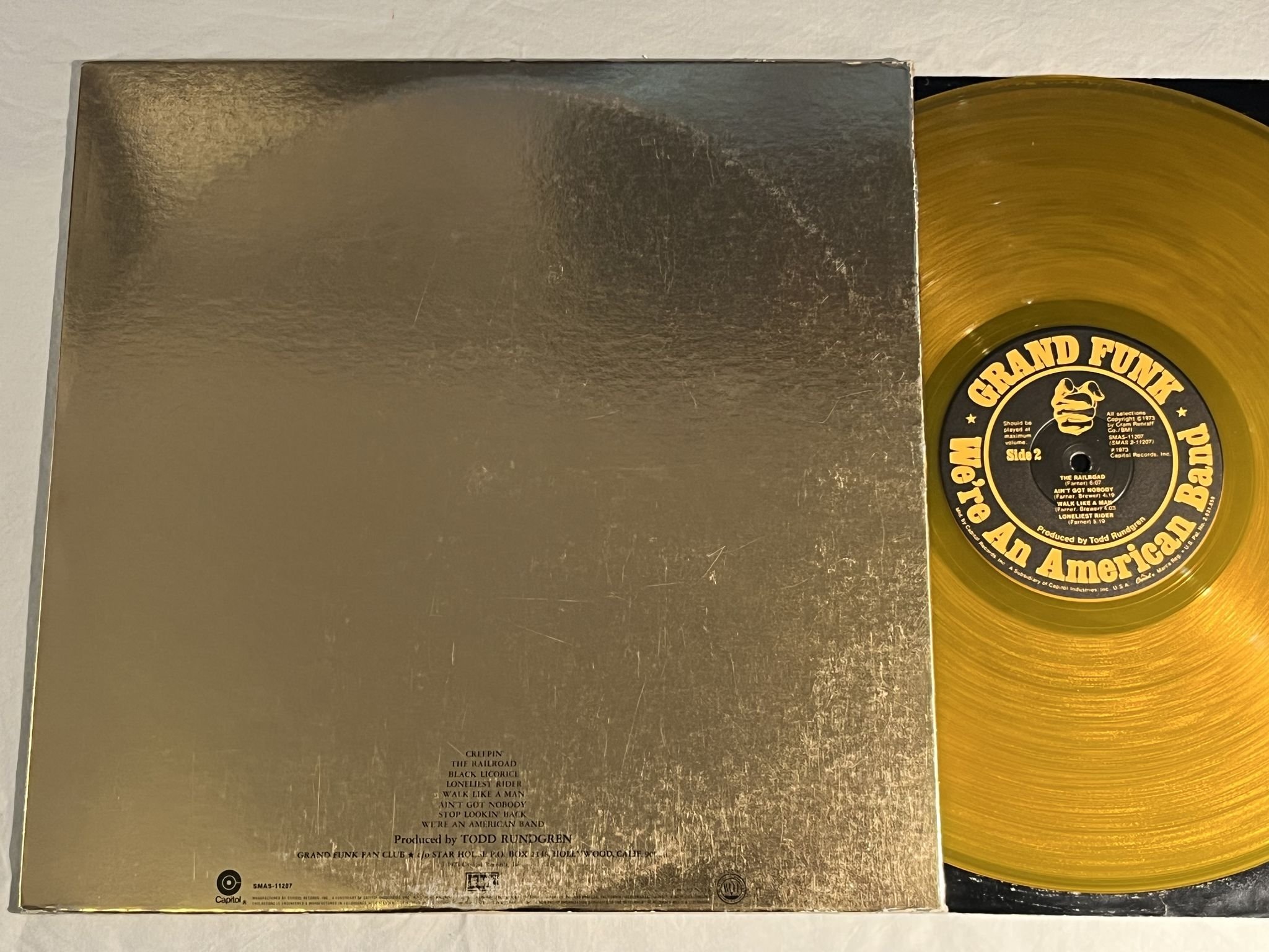 Omslagsbild för skivan GRAND FUNK we're an american band LP -73 US CAPITOL SMAS-11207 * YELLOW VINYL *