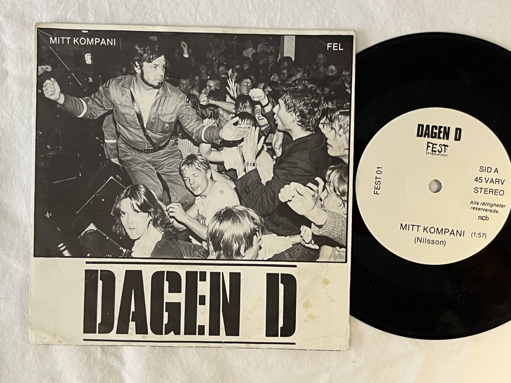 Omslagsbild för skivan DAGEN D mitt kompani 7" -81 Swe FEST PRODUKTION FEST 01