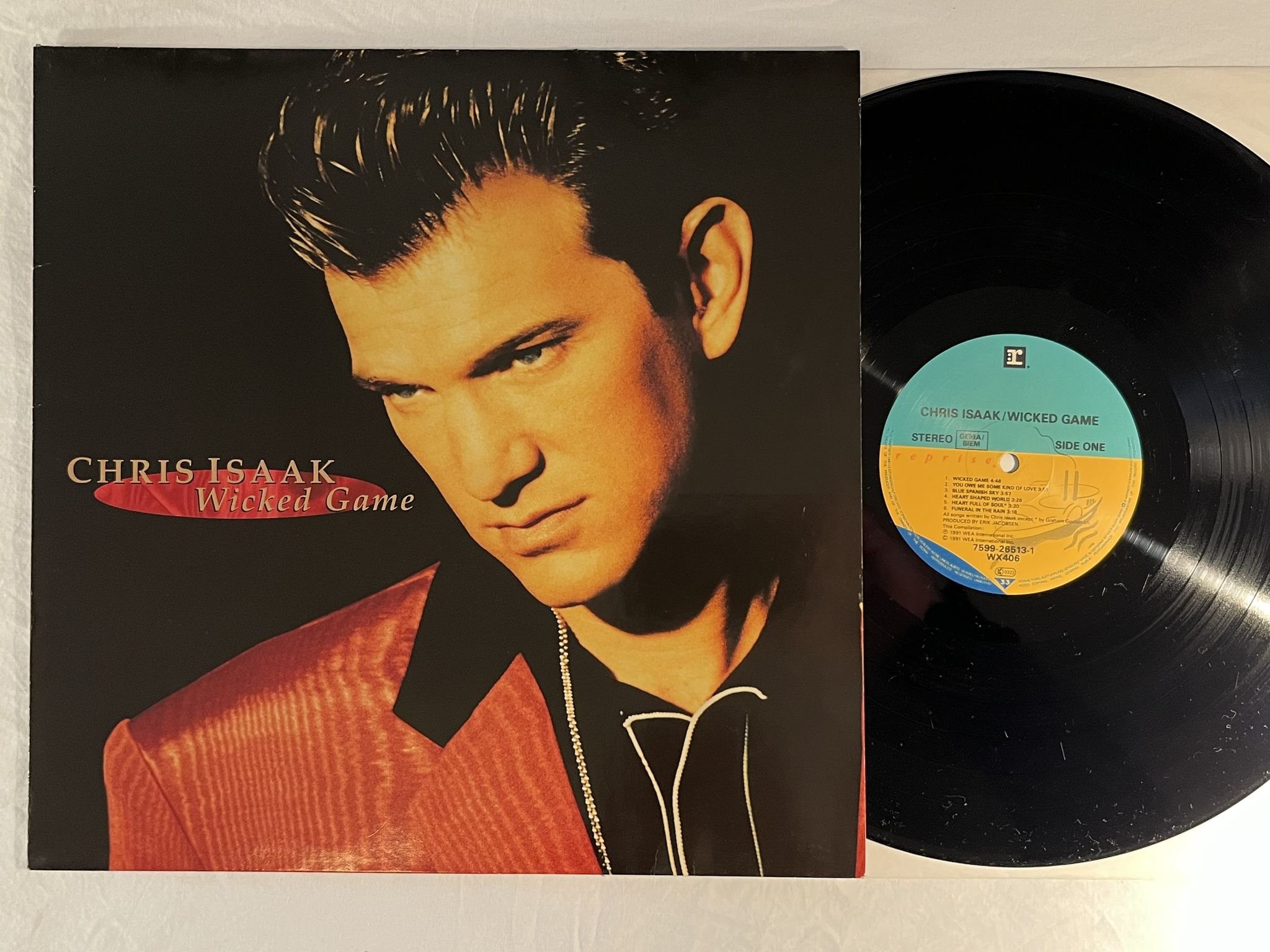 Omslagsbild för skivan CHRIS ISAAK wicked game LP -91 eu REPRISE 7599-26513-1 *** CLASSIC ***