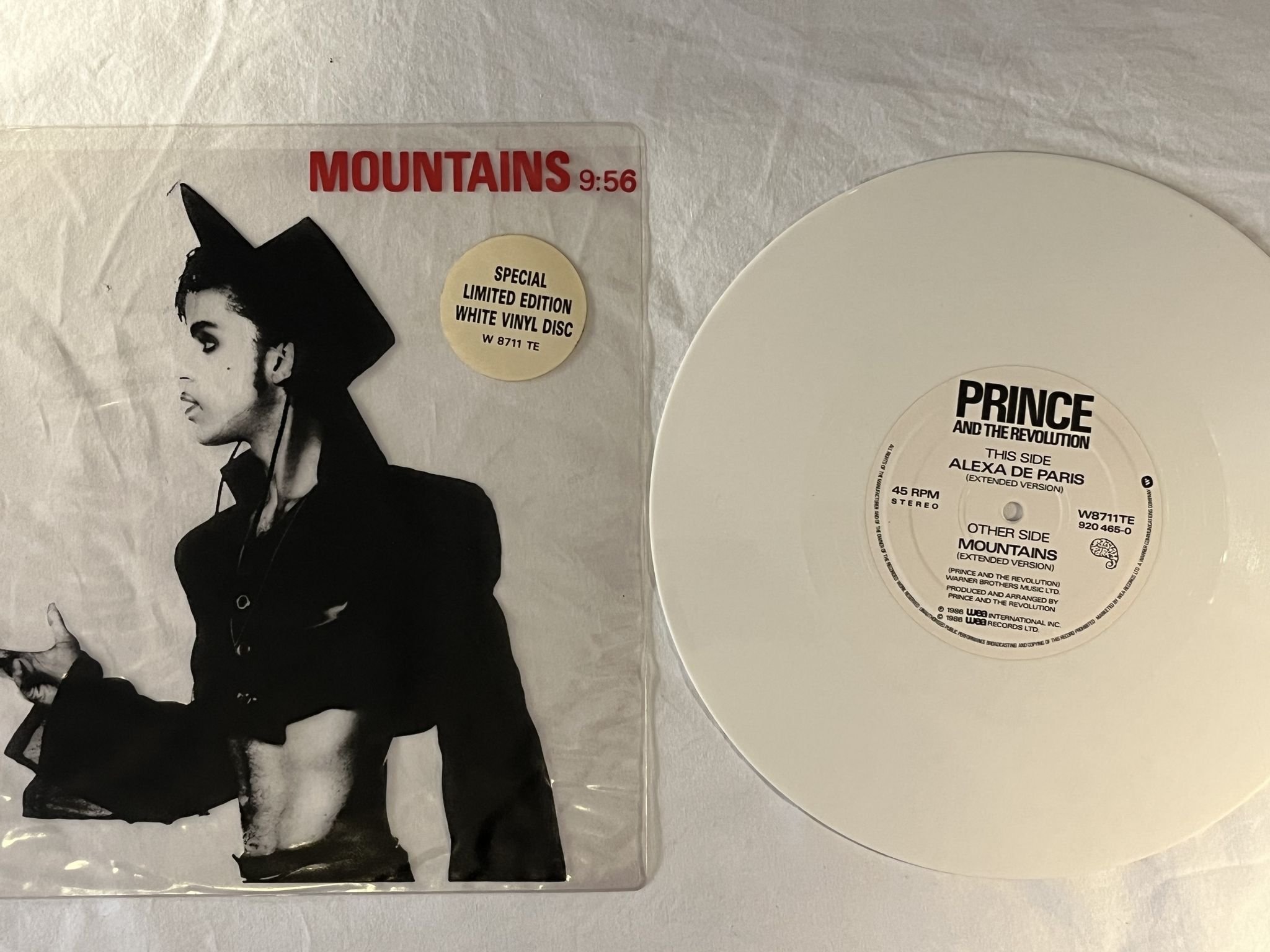 Omslagsbild för skivan PRINCE mountains 10" UK -86 PAISLEY PARK W8711TE ** white vinyl **