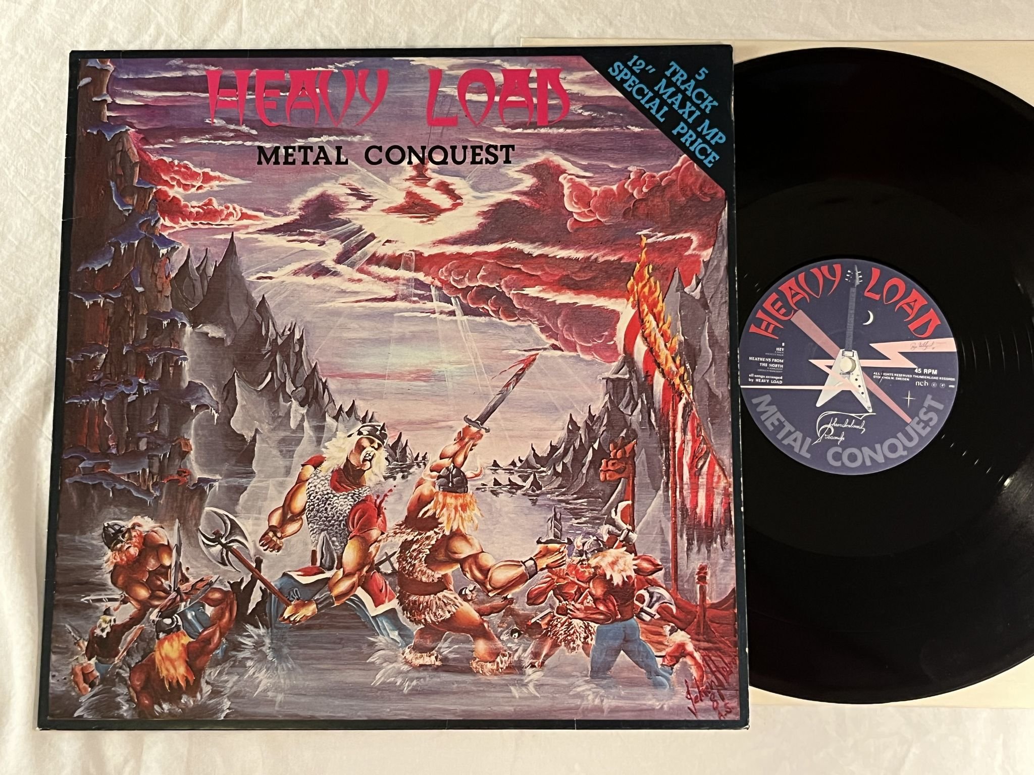 Omslagsbild för skivan HEAVY LOAD metal conquest 12"EP -81 Swe THUNDERLOAD TMP 811 *** POSTER ***