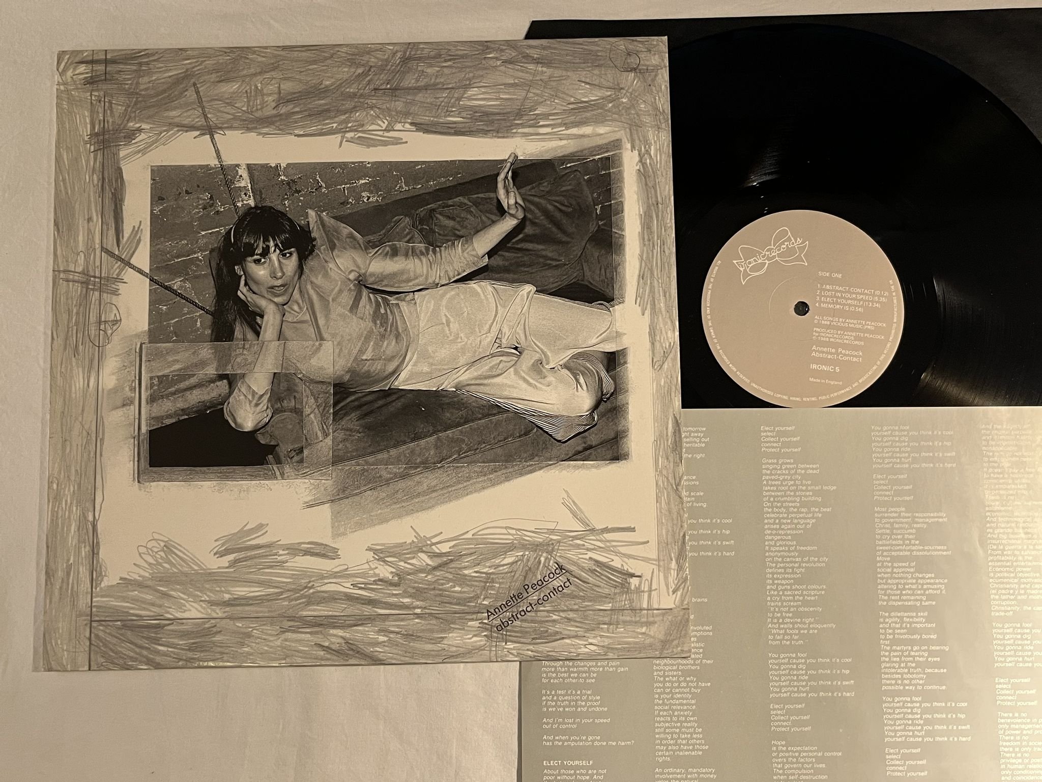 Omslagsbild för skivan ANNETTE PEACOCK abstract-contact LP -88 UK IRONIC RECORDS IRONIC 5