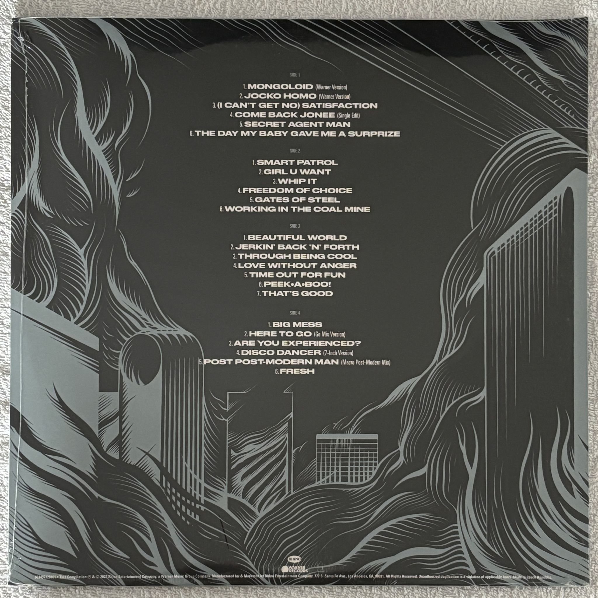 Omslagsbild för skivan DEVO 50 years of de-evolution (1973-2023) 2xLP Rhino Records 603497828401