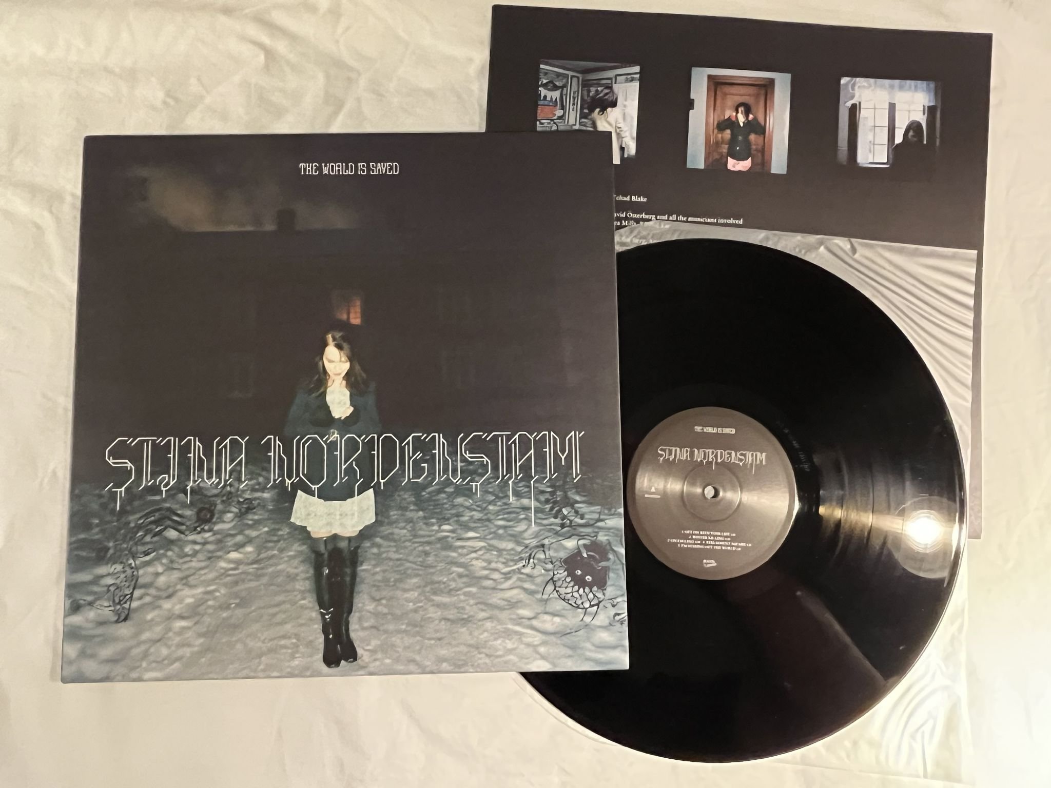 Omslagsbild för skivan STINA NORDENSTAM The World Is Saved LP + 7" 2015 BEACON BNSD006 * Ltd 179/500 *