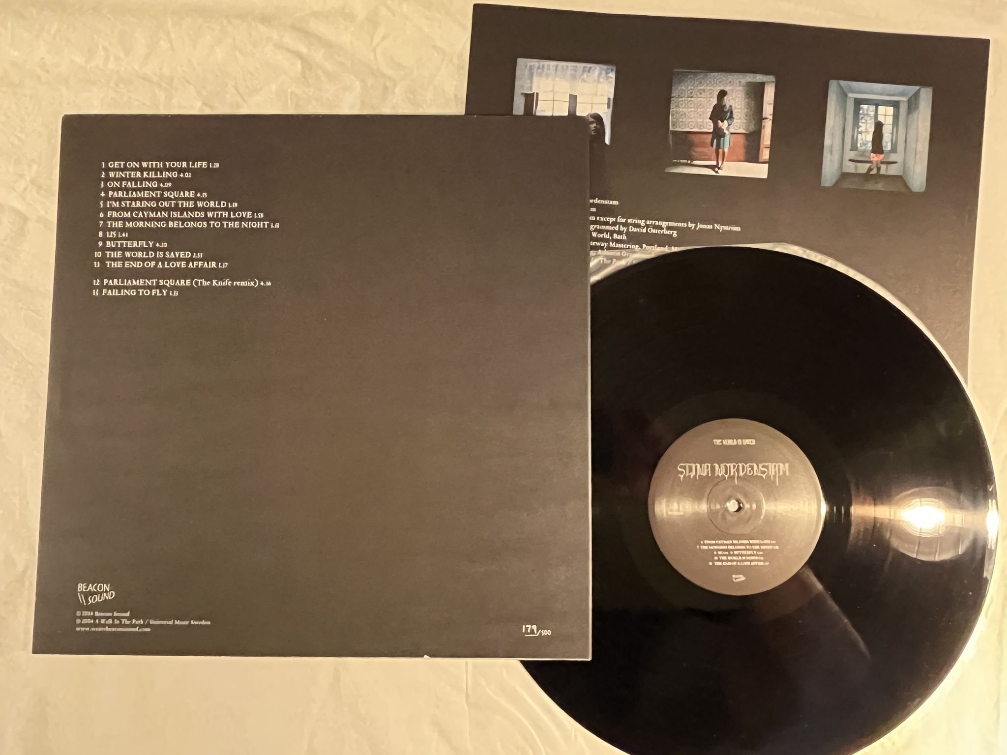 Omslagsbild för skivan STINA NORDENSTAM The World Is Saved LP + 7" 2015 BEACON BNSD006 * Ltd 179/500 *