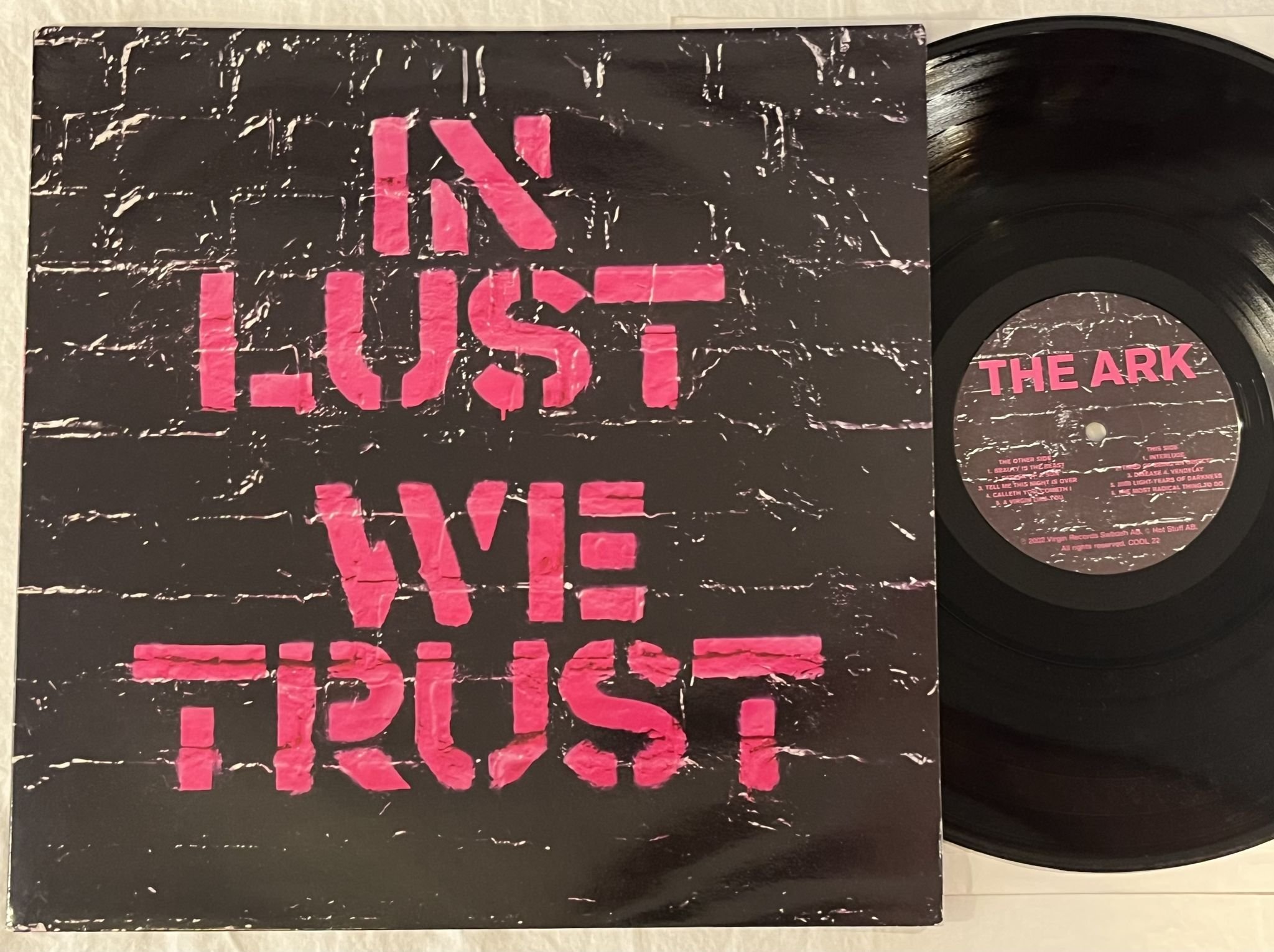 Omslagsbild för skivan THE ARK In Lust We Trust LP 2002 HOT STUFF COOL 22