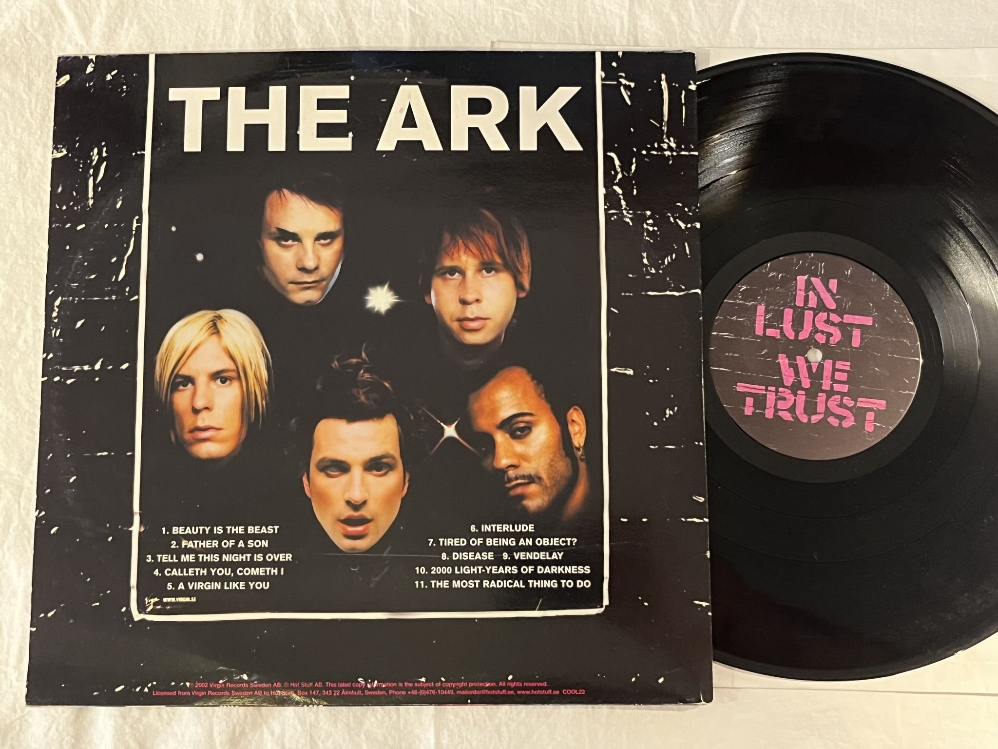 Omslagsbild för skivan THE ARK In Lust We Trust LP 2002 HOT STUFF COOL 22