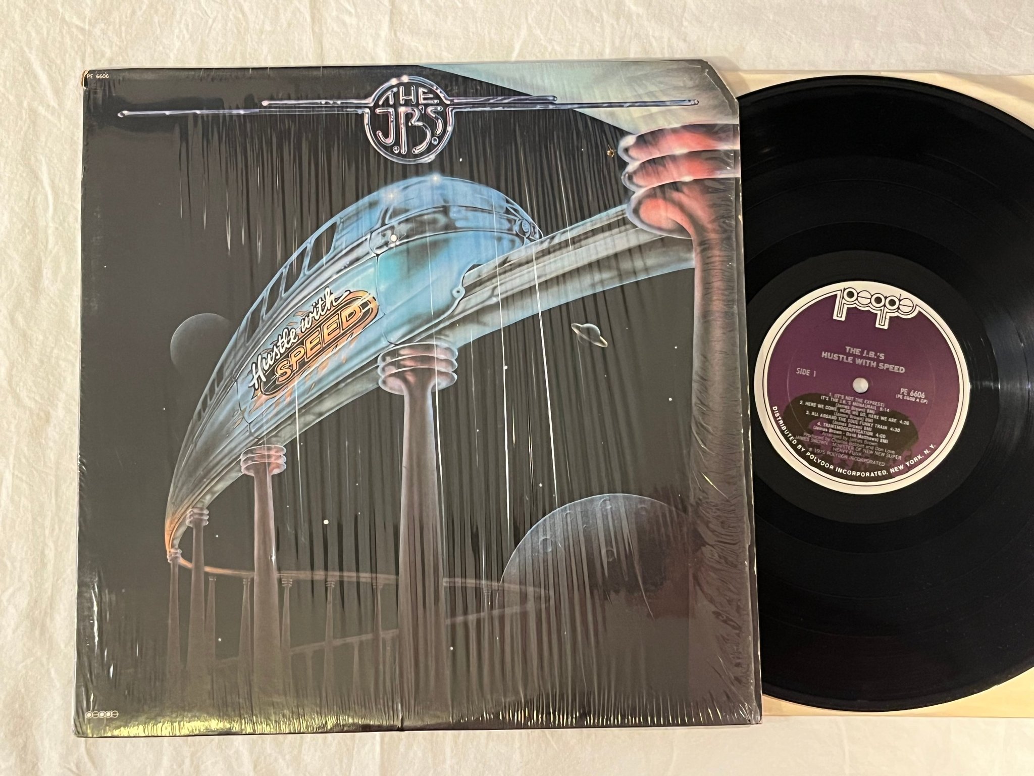 Omslagsbild för skivan THE JB`s hustle with speed LP -75 US PEOPLE PE 6606 *** FUNK ***