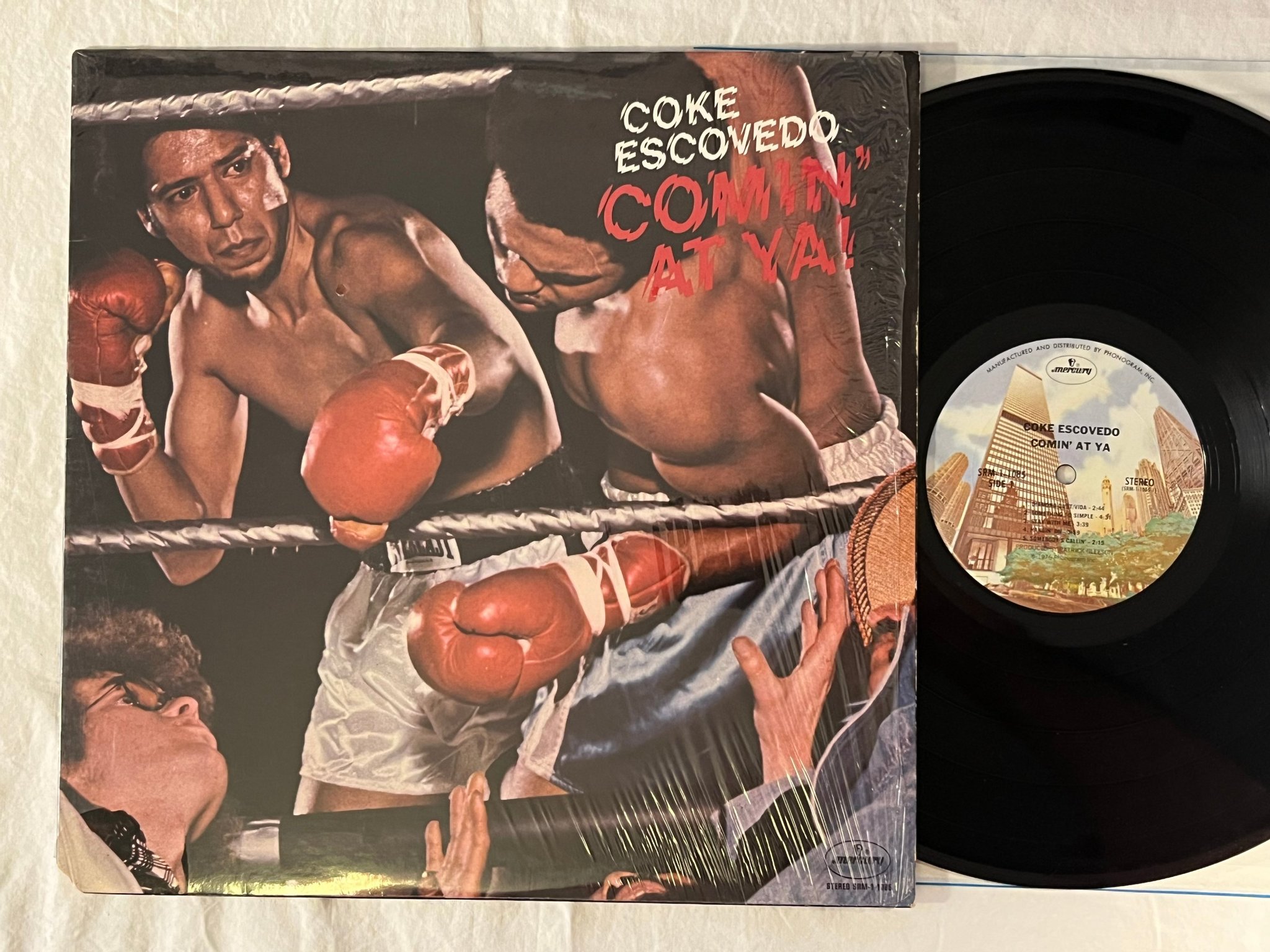 Omslagsbild för skivan COKE ESCOVEDO comin' at ya LP -76 US MERCURY SRM 1-1085 ** I wouldn't change **