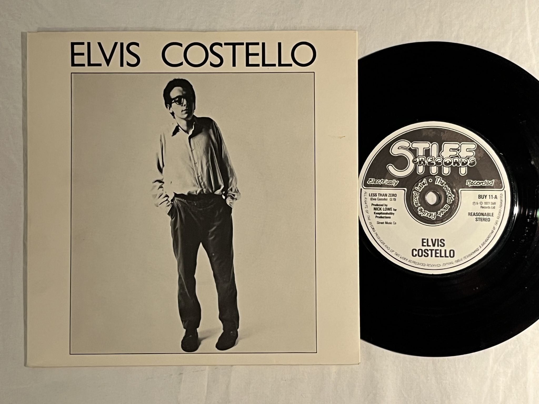 Omslagsbild för skivan ELVIS COSTELLO less than zero 7" -77 UK STIFF BUY 11